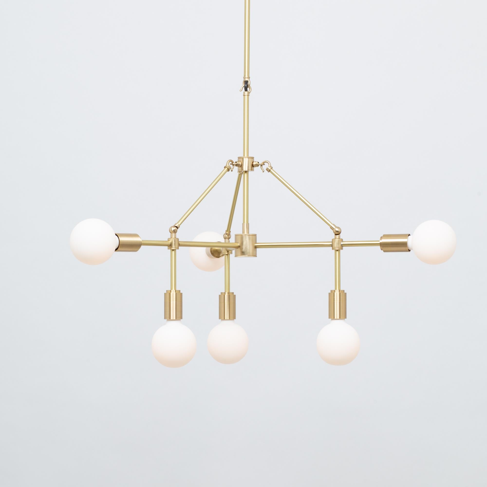 Six Sphere Chandelier 
Solid Brass, Satin Finished, Lacquered 
Six Tala Sphere III Dim to Warm Bulbs.
2000K - 2800K  95CRI
3600 Dim to Warm Lumens 
Sphere III bulbs included
Medium ø85cm Chandelier Inc Bulb 
Handmade in Hackney Wick by Lights of