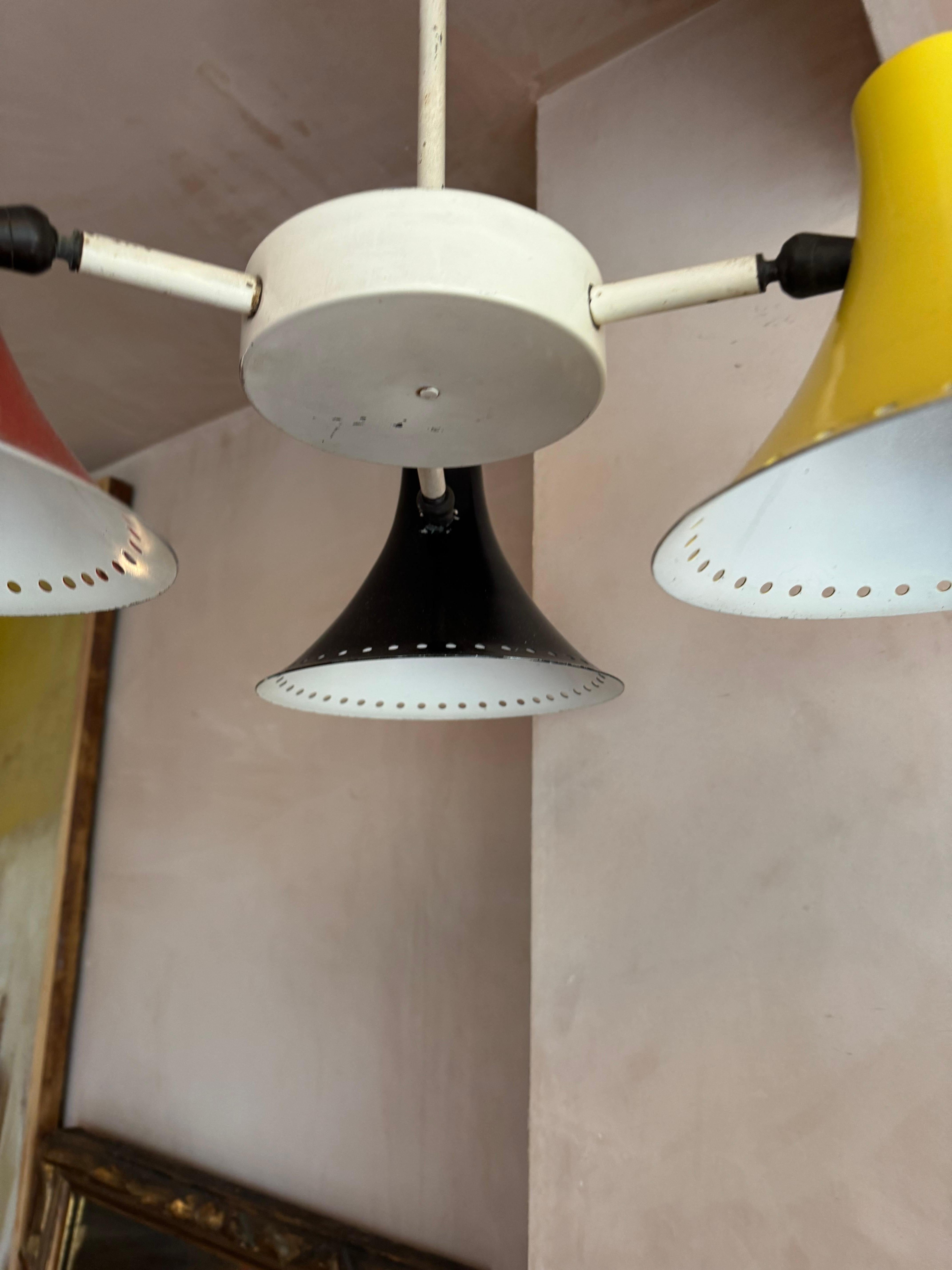 British Three armed 1950’s red, black, yellow ceiling light. For Sale