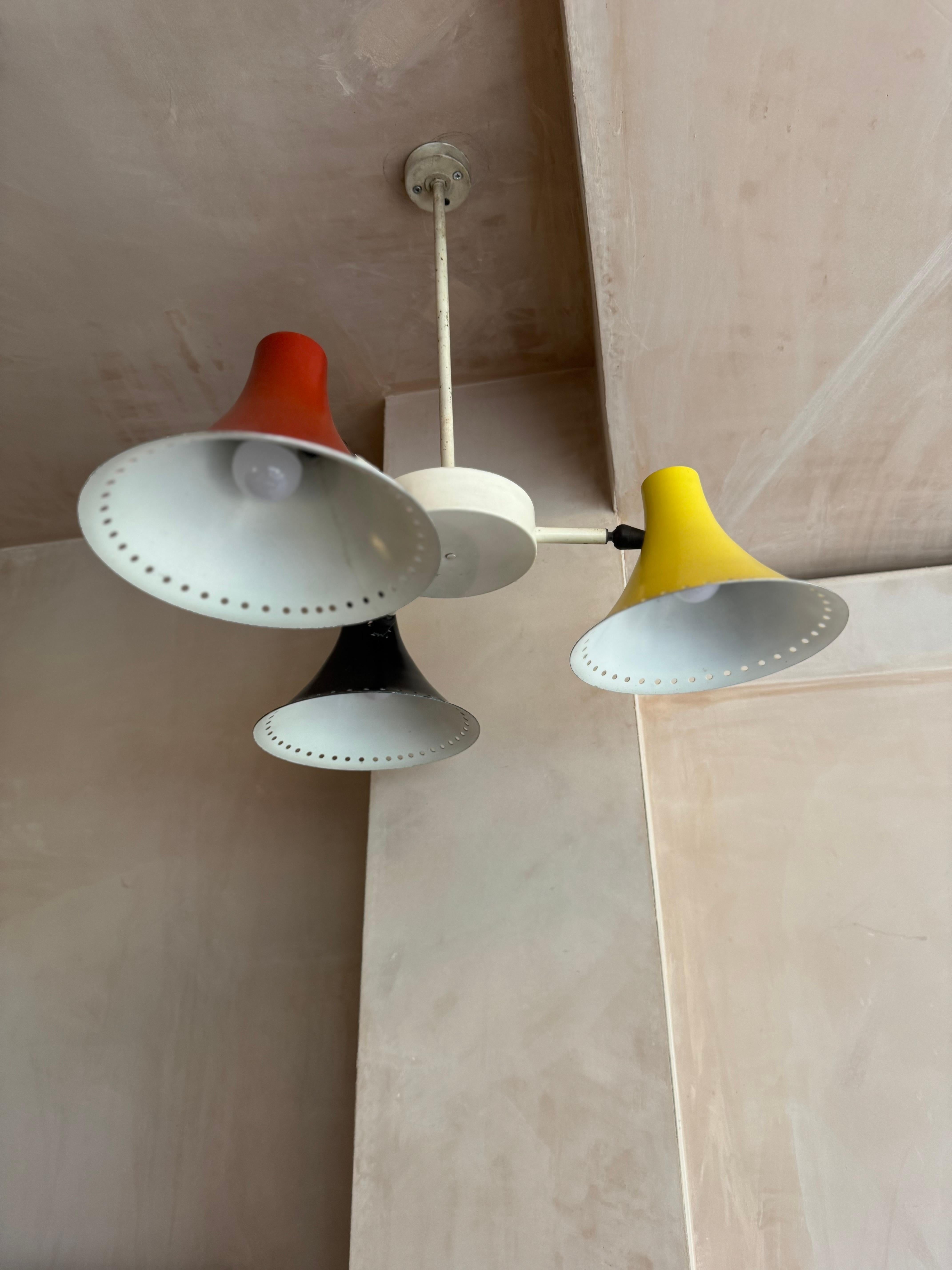 Three armed 1950’s red, black, yellow ceiling light. In Good Condition For Sale In London, GB