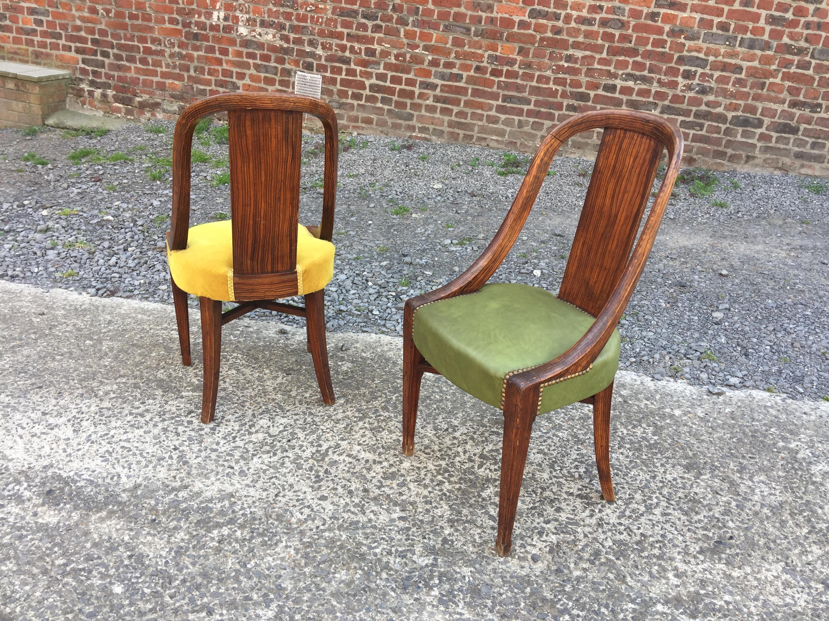 Three Art Deco chairs, in wood painted faux wood decor, circa 1925.