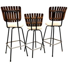 Three Arthur Umanoff Style Upholstered and Wood Bar Stools