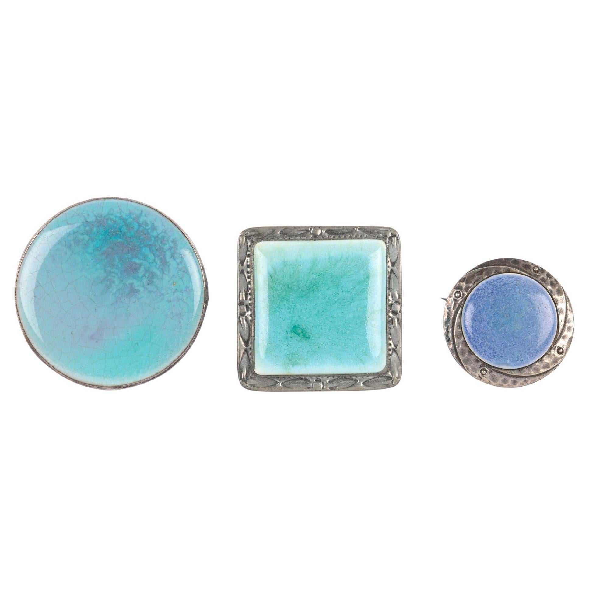 Three Arts & Crafts Ruskin Mounted Brooches For Sale