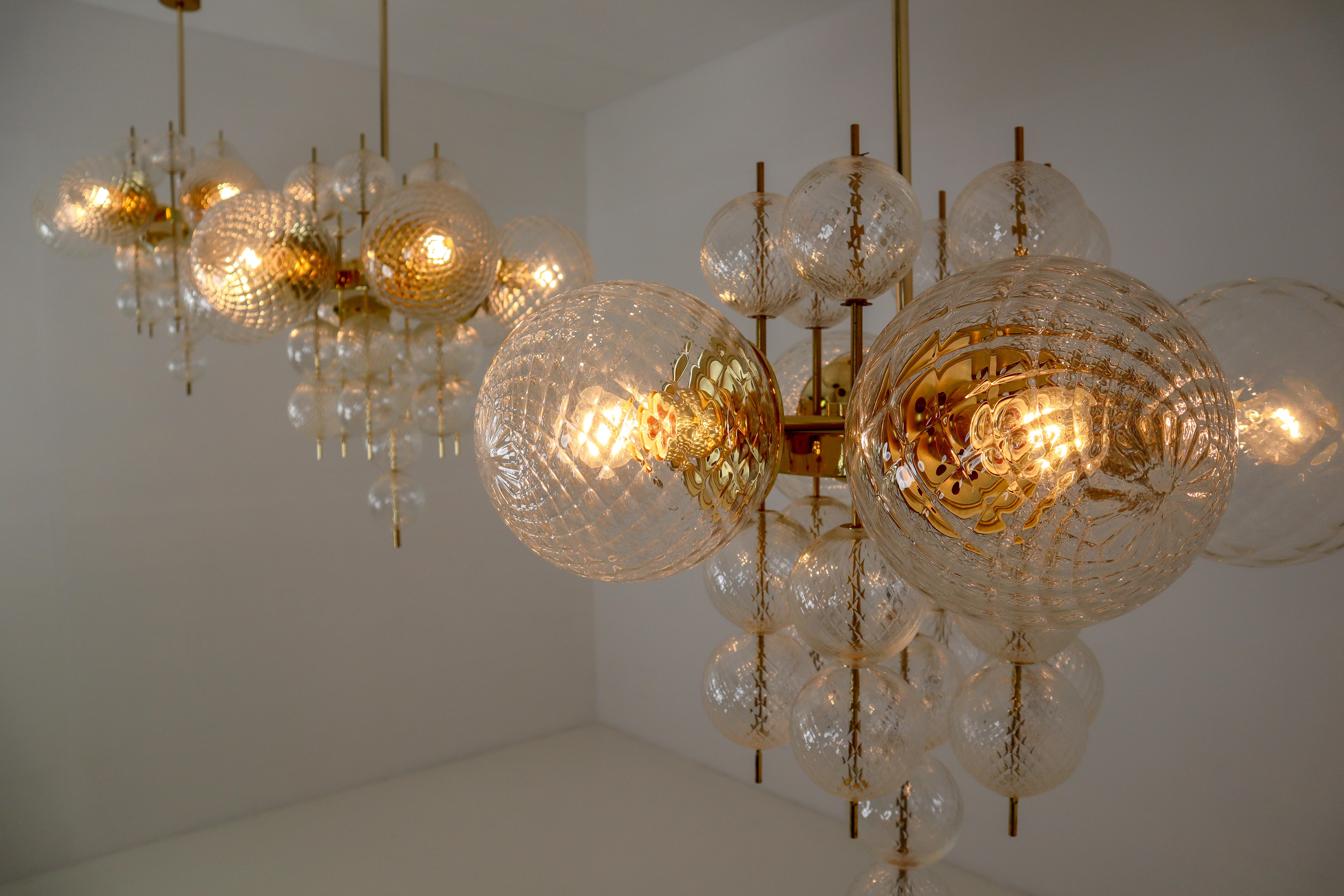 Three Brass Chandeliers Produced by Fa. Preciosa in Kamenicky Senov, 1970s In Excellent Condition In Almelo, NL