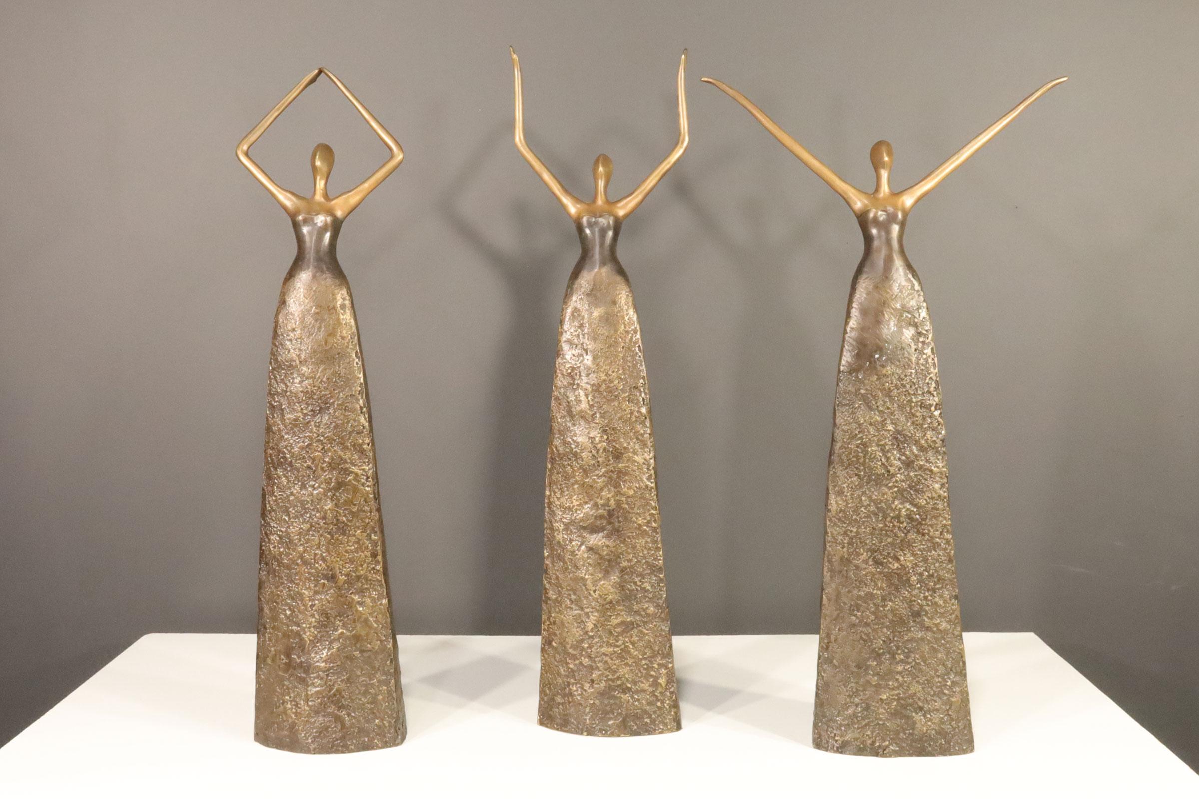 Three tall female figured bronzes in the style of Tom Corbin.
Each measures as follows:

Measures: 29.75