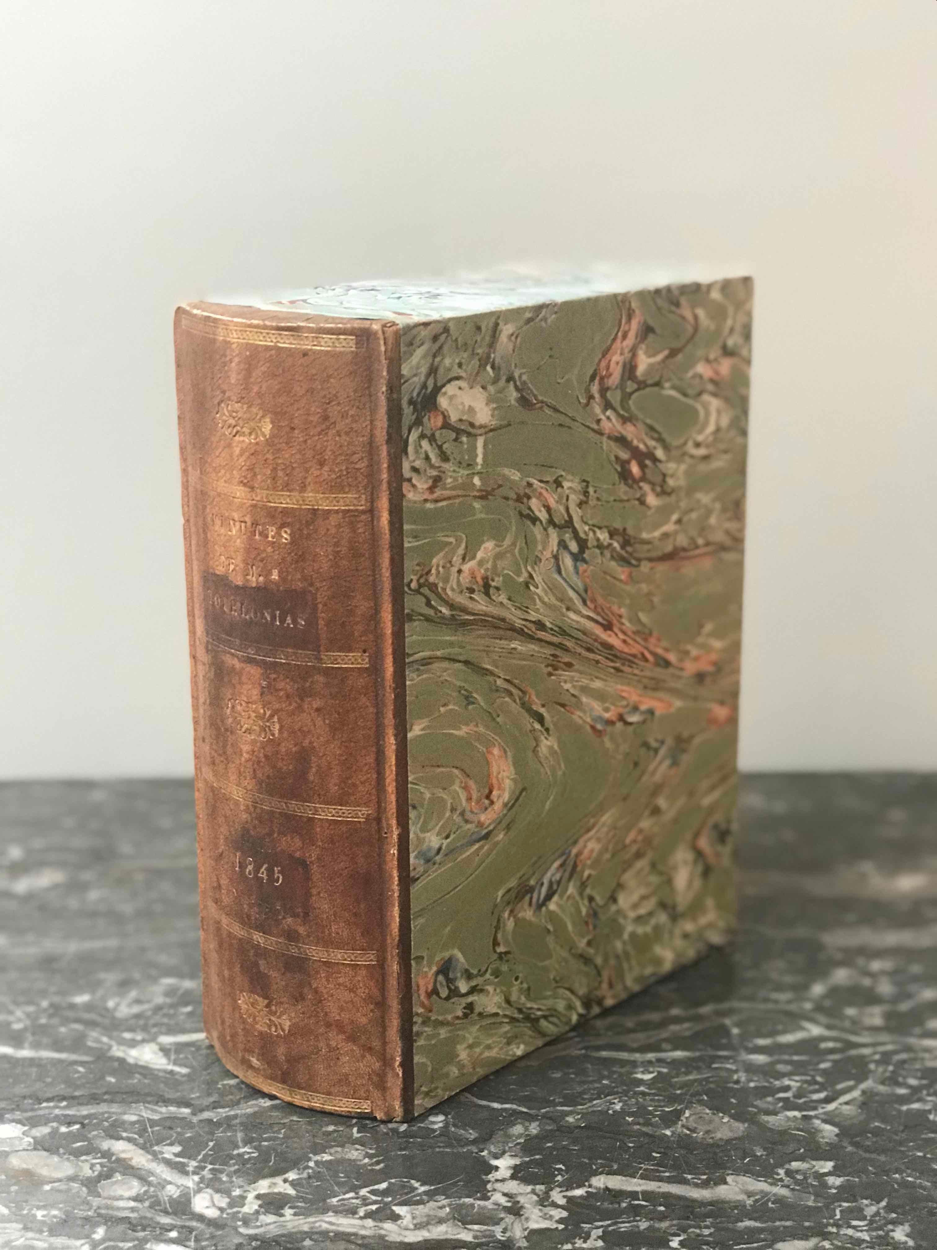 Three brown leather book boxes from England circa 1900. 