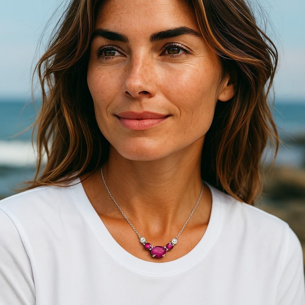 Introducing our exquisite Burma Red Rubies, weighing 1.25 carat and Bezel Diamonds, weighing 0.14 carat, 14 karat Yellow Gold Pendant Necklace! This stunning piece of jewelry combines the allure of three Burma Red Rubies with the elegance of two