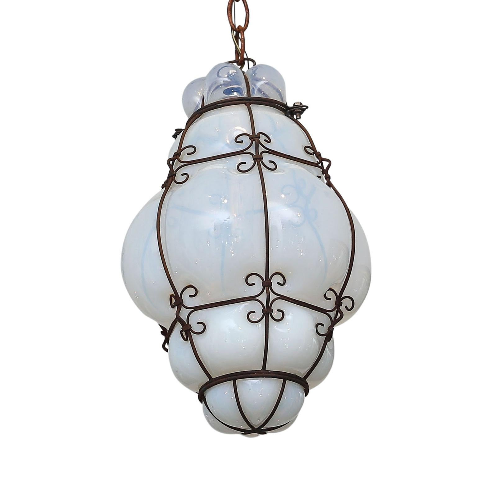 Three Caged White Glass Italian Pendants In Fair Condition For Sale In Houston, TX