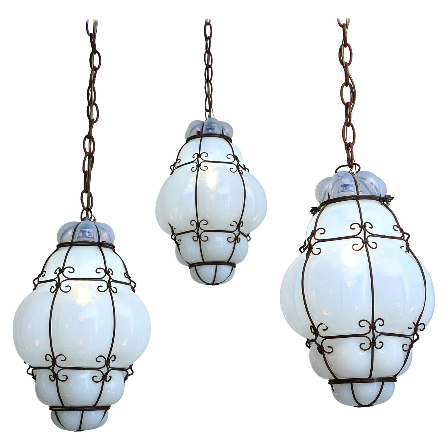 Three Caged White Glass Italian Pendants For Sale