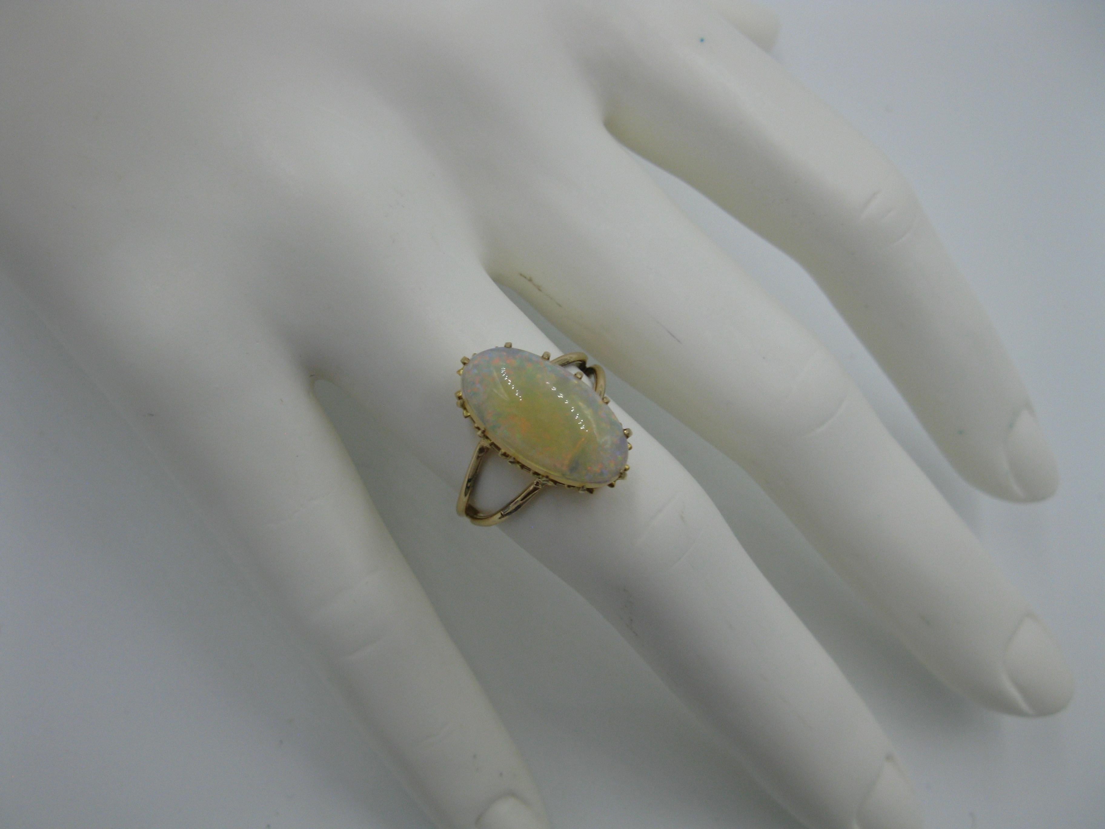 Oval Cut 3 Carat Opal Ring 14 Karat Gold Yellow Green Orange Mid-Century Modern For Sale