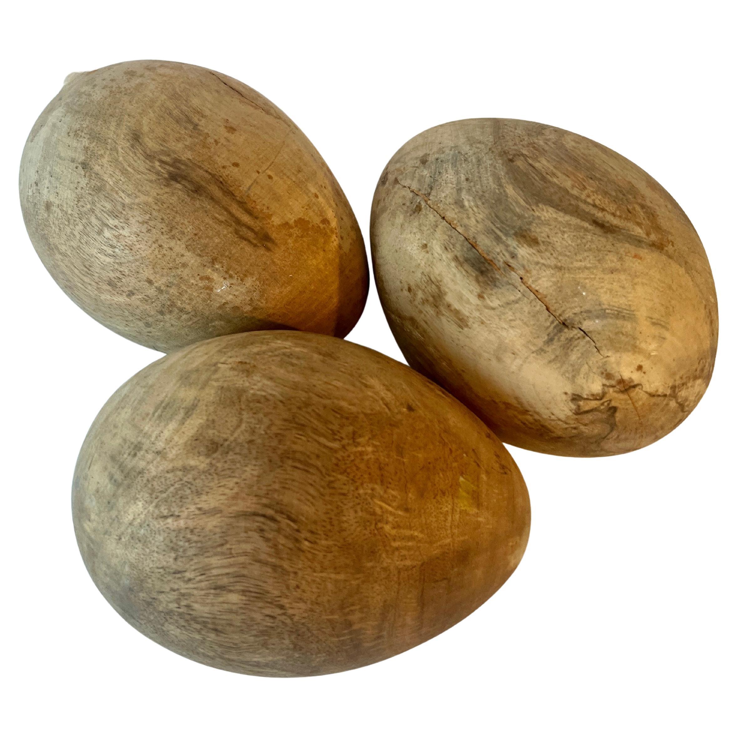 Three Carved Oversized Decorative Wooden Eggs