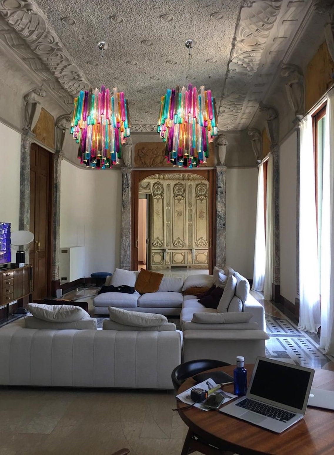 Fantastic Trio Murano chandeliers each made by 107 Murano crystal multicolored prism in a nickel metal frame. The glasses are transparent, blue, smoky, purple, green, yellow and pink.
Dimensions: 55.10 inches height (140cm) with chain, 29.50 inches