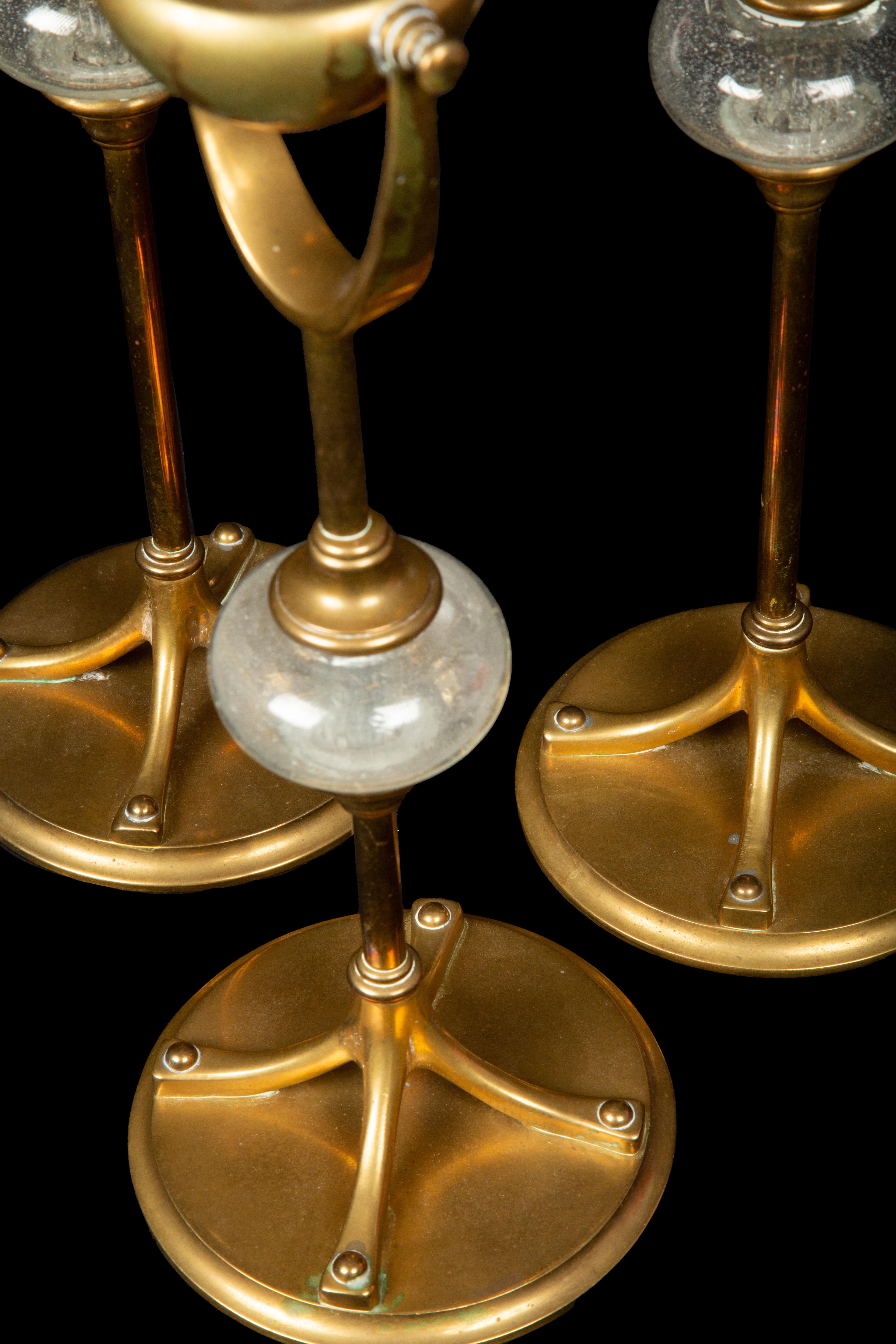 Bronze Three Chapman Brass and Glass Candlesticks