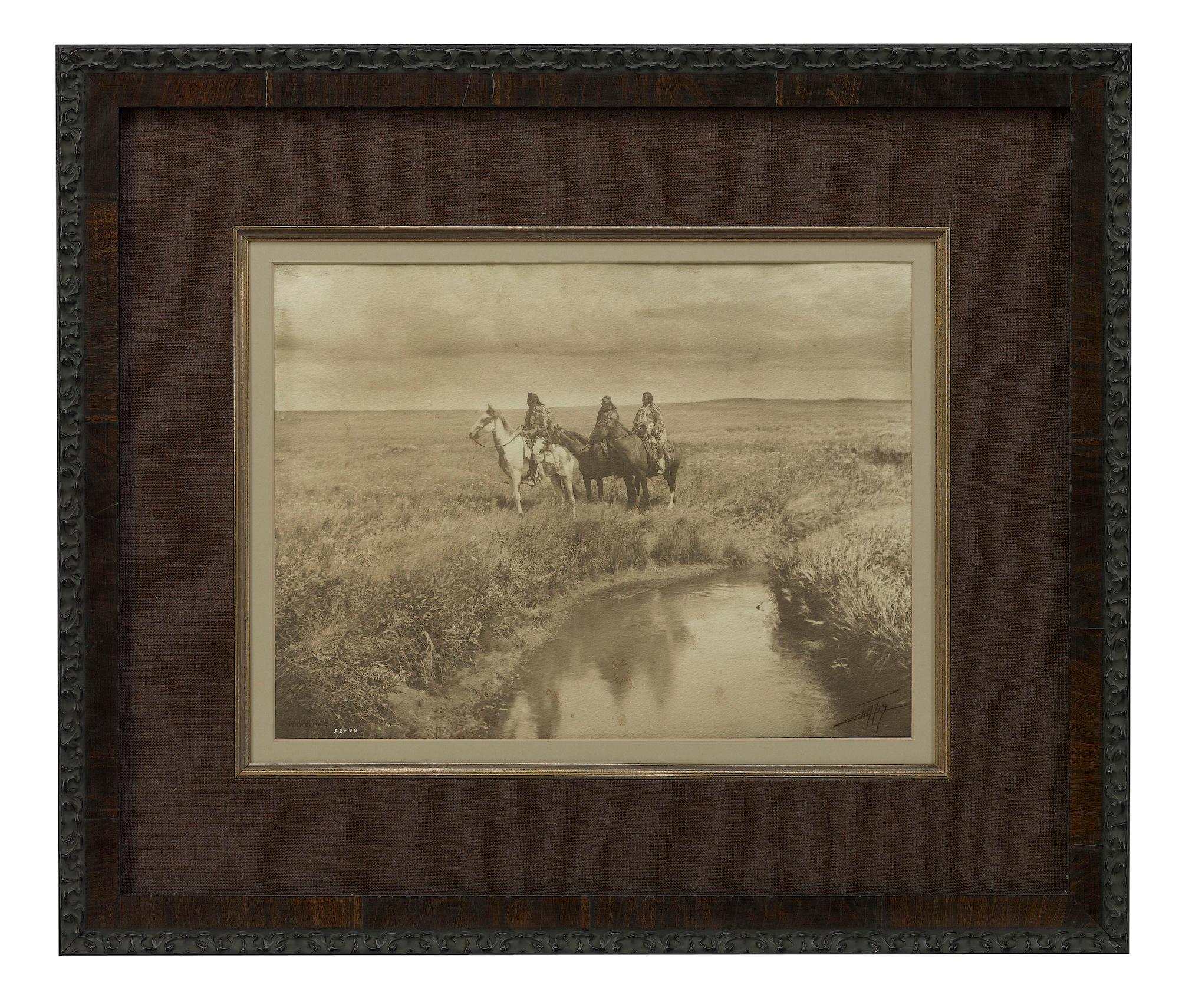 Presented is a rare, platinum Master Exhibition Print of Edward Curtis’ The Three Chiefs. Typical of Curtis’ Master Exhibition Prints, this platinum print is double-mounted, signed, with an embossed copyright credit and date stamp. His numeric