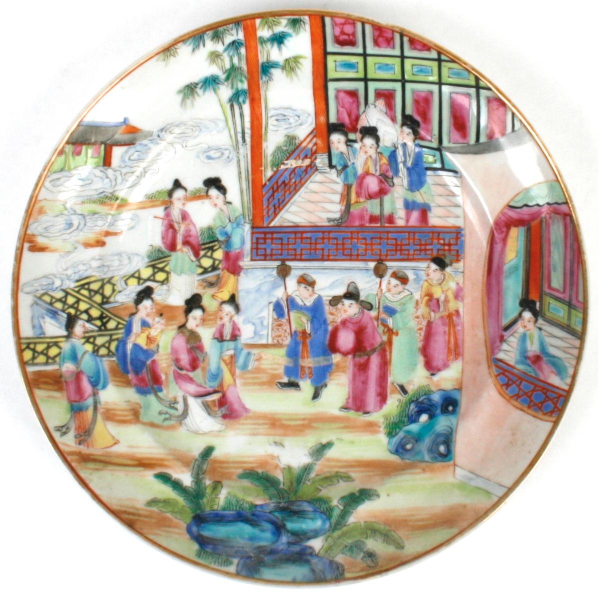 A set of three Chinese export rose Mandarin cabinet plates from the late 18th century. The pieces display three varied traditional scenes emphasizing figures in architectural garden settings. Two of the plates have floral boarders with Chinese