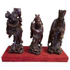 Three Chinese Sages In Carved Wood—19th Century