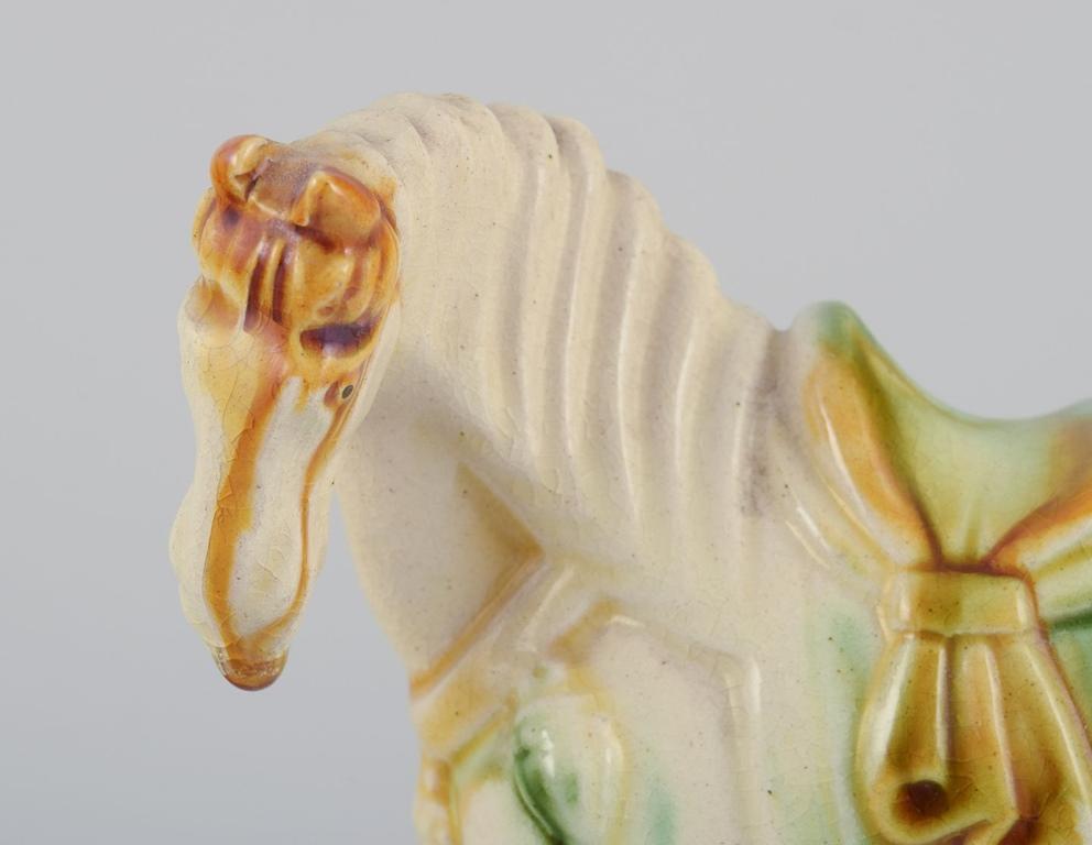 Three Chinese Tang horses in earthenware. Approx. 1930s For Sale 1