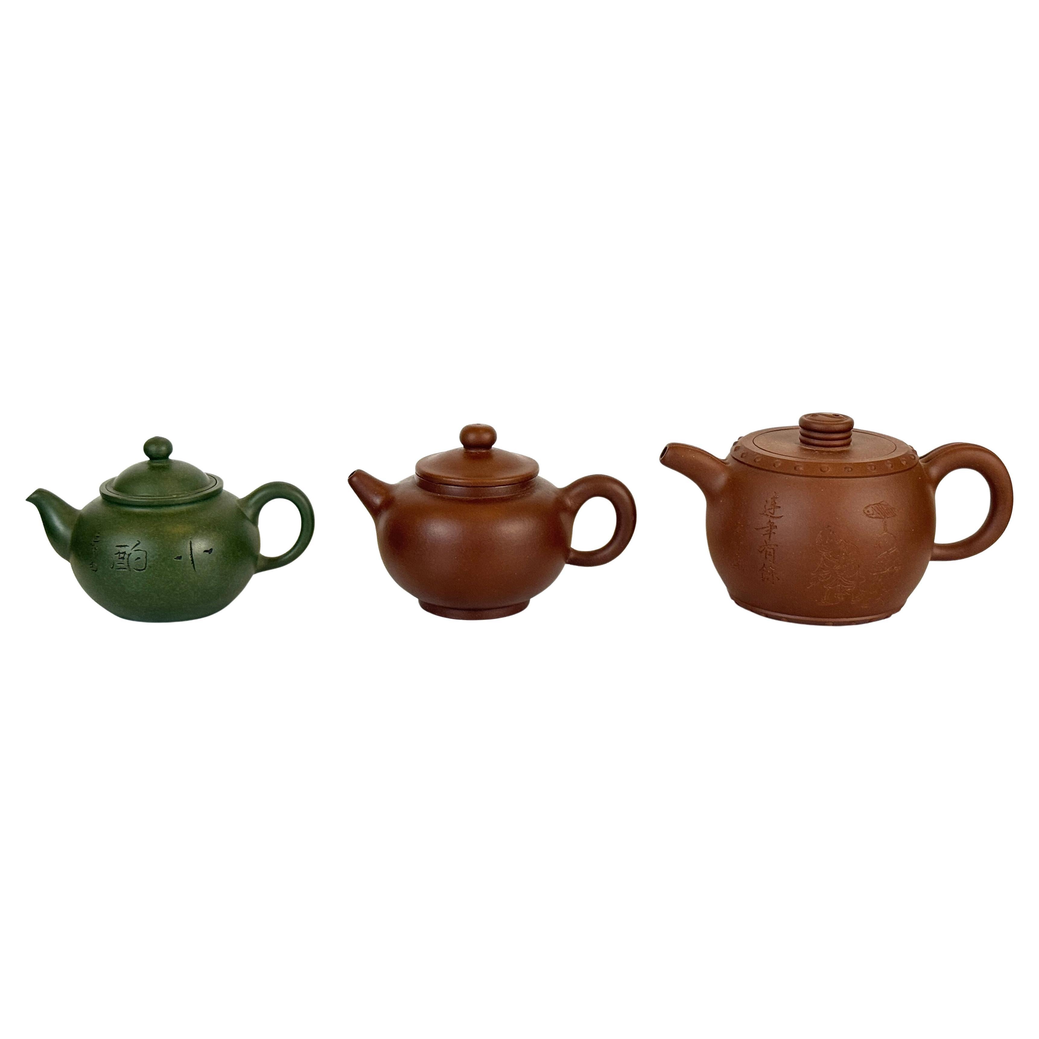 Three Chinese Yixing Clay Teapots