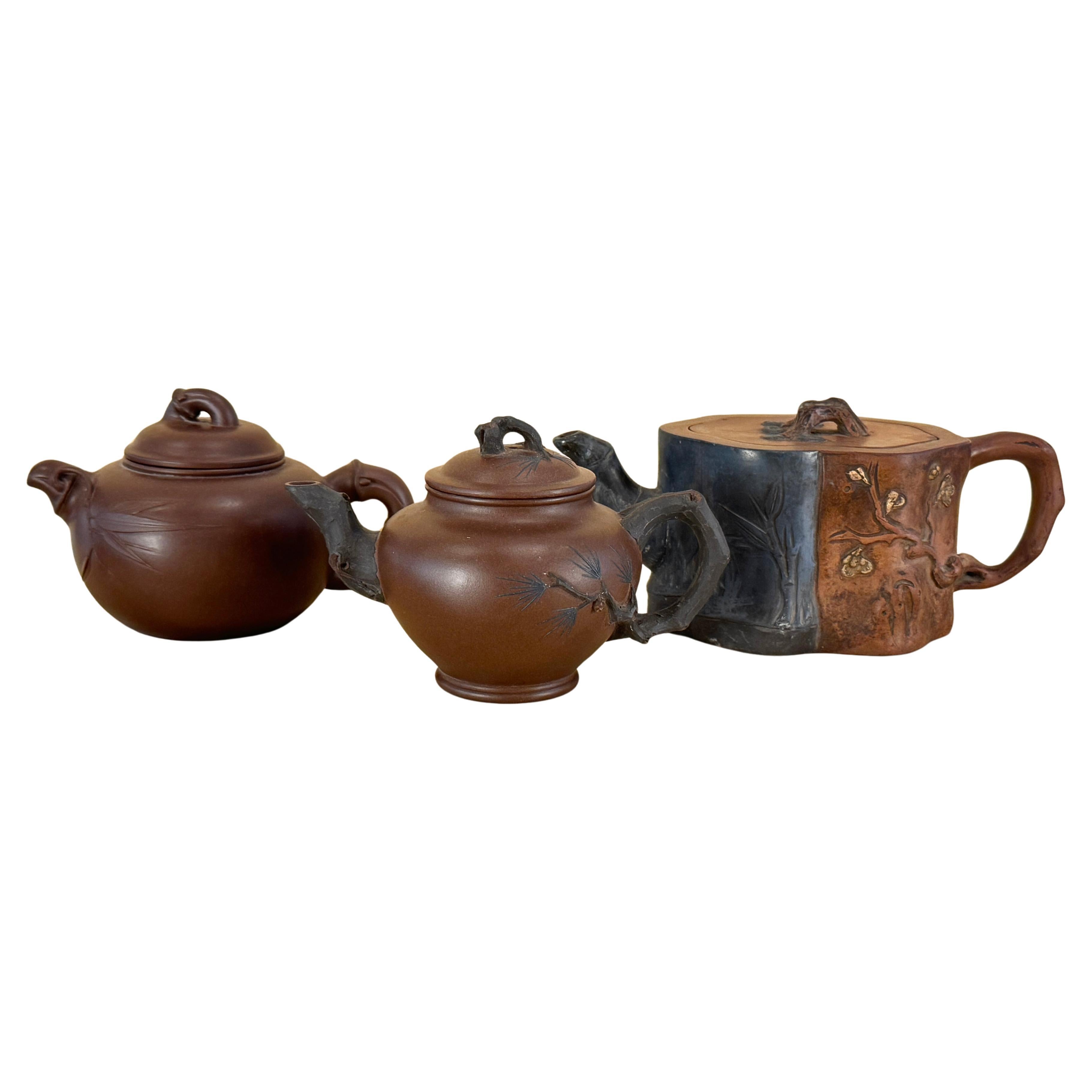 Three Chinese Yixing Clay Teapots with Bamboo Decoration
