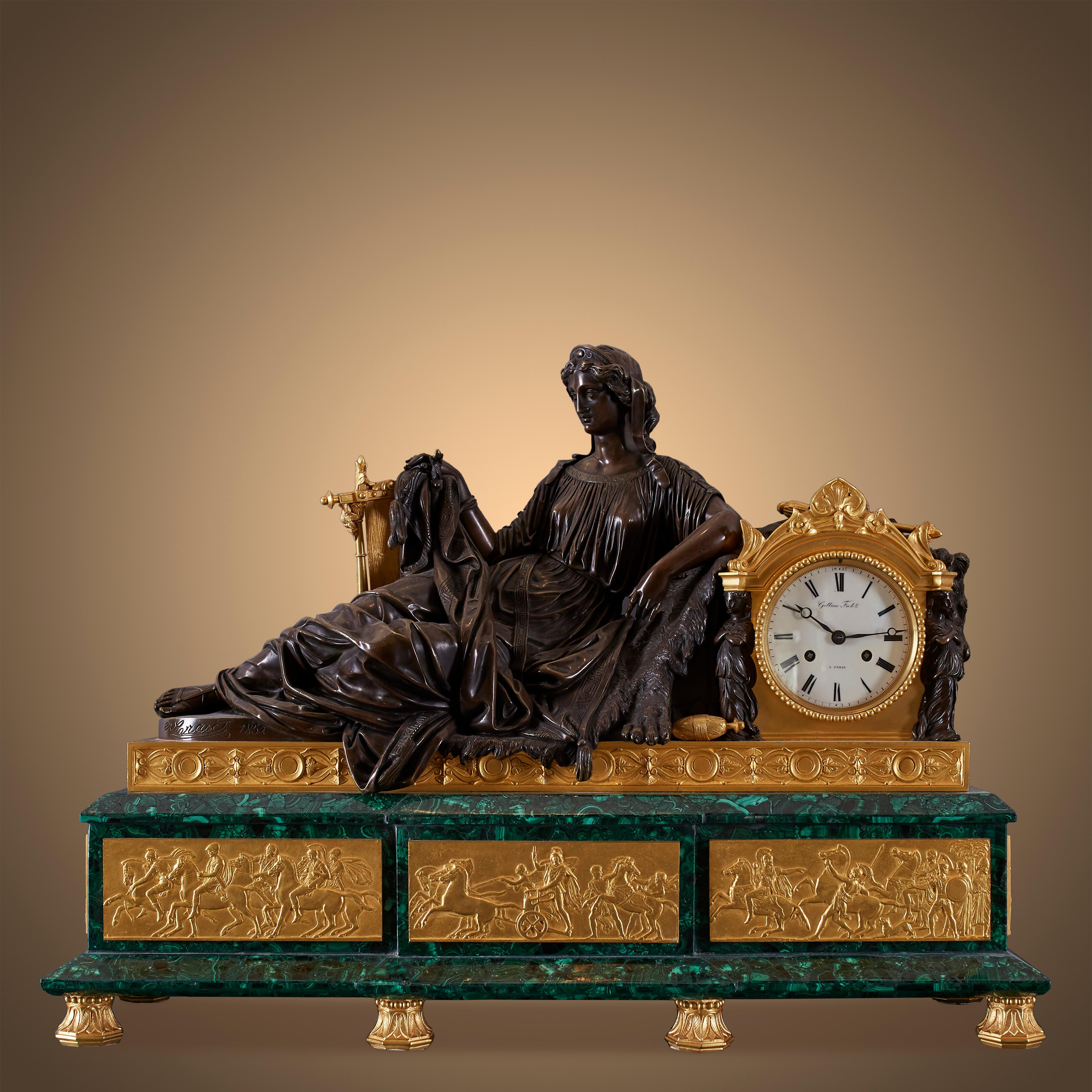 Signed Three-Piece Clock Garniture 19th Century. 

Malachite is a gemstone known for its vibrant green color and unique banding. In feng shui and metaphysical beliefs, malachite is highly valued for several reasons:

Protection: Malachite is