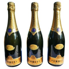 Three closed collectible bottles with box Champagne Pommery 1983