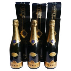 Three closed collectible bottles with box Champagne Pommery 1983