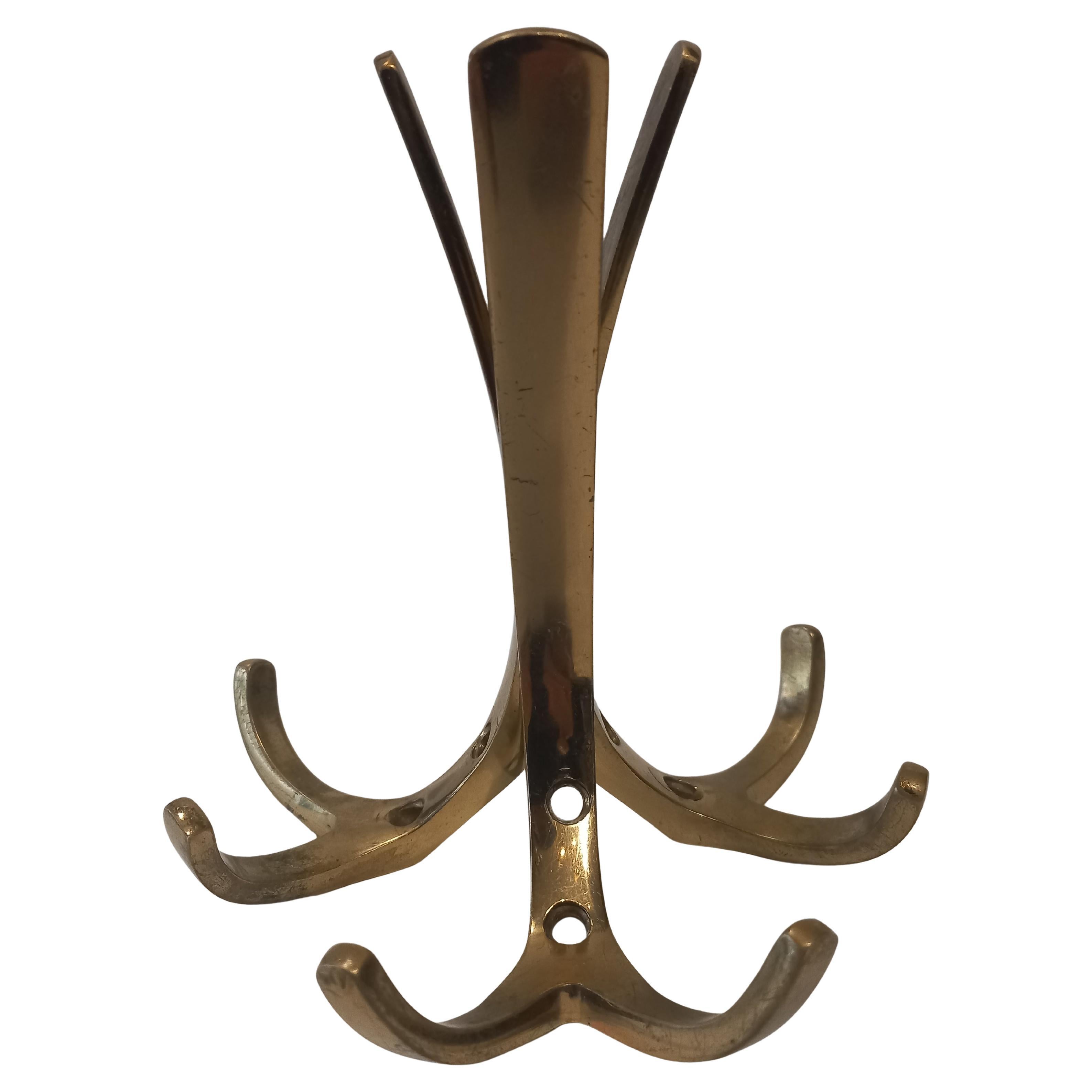Three coat hooks in the style of Carl Auböck, 1950s