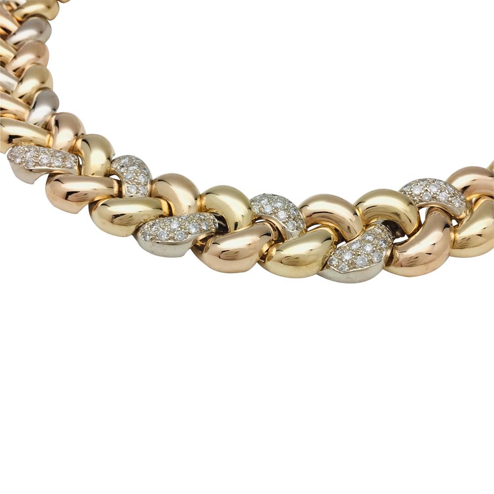 A 750/000 three colours of gold Poiray articulated necklace, 