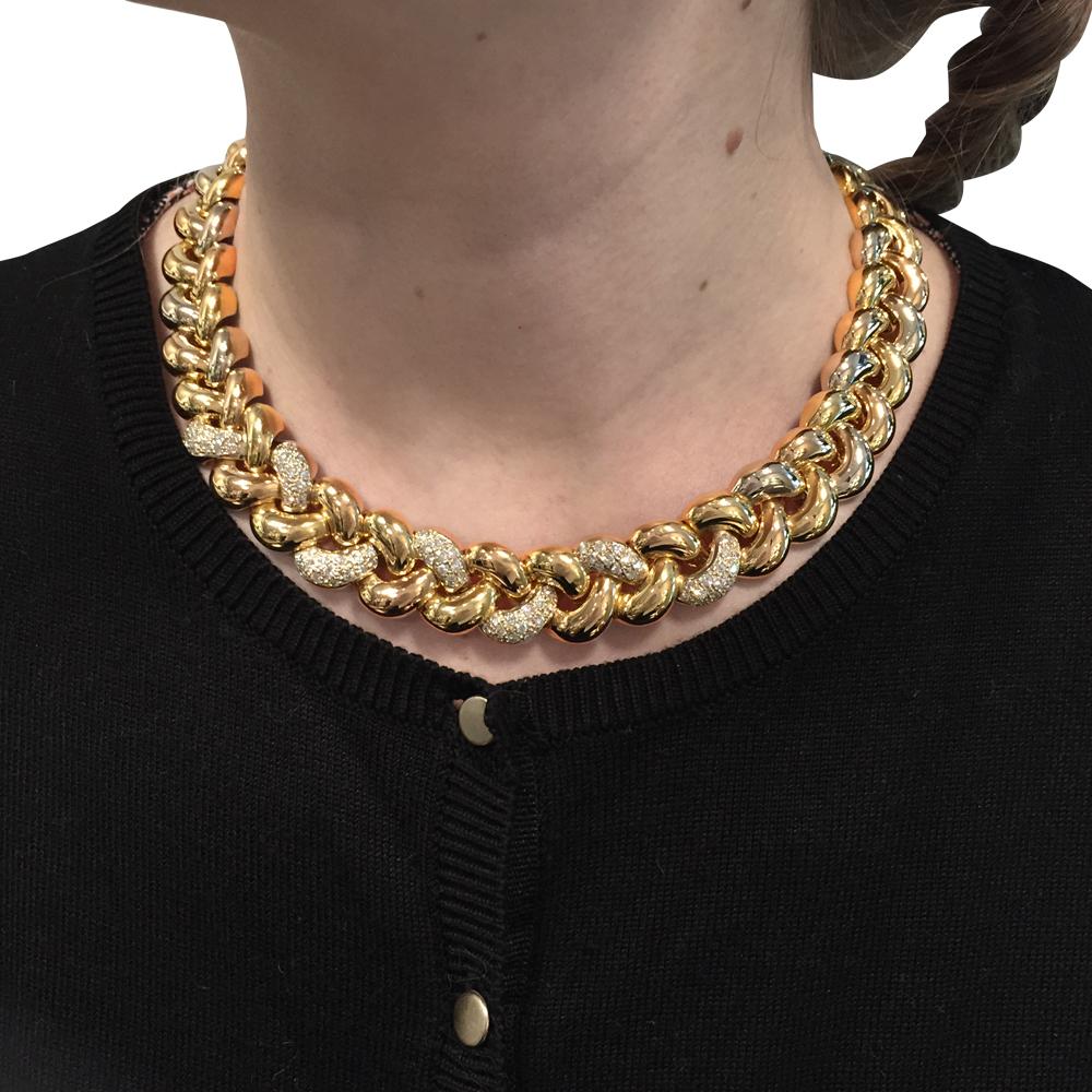 Poiray Necklace, three colours of gold designed as a braid with diamonds. 1