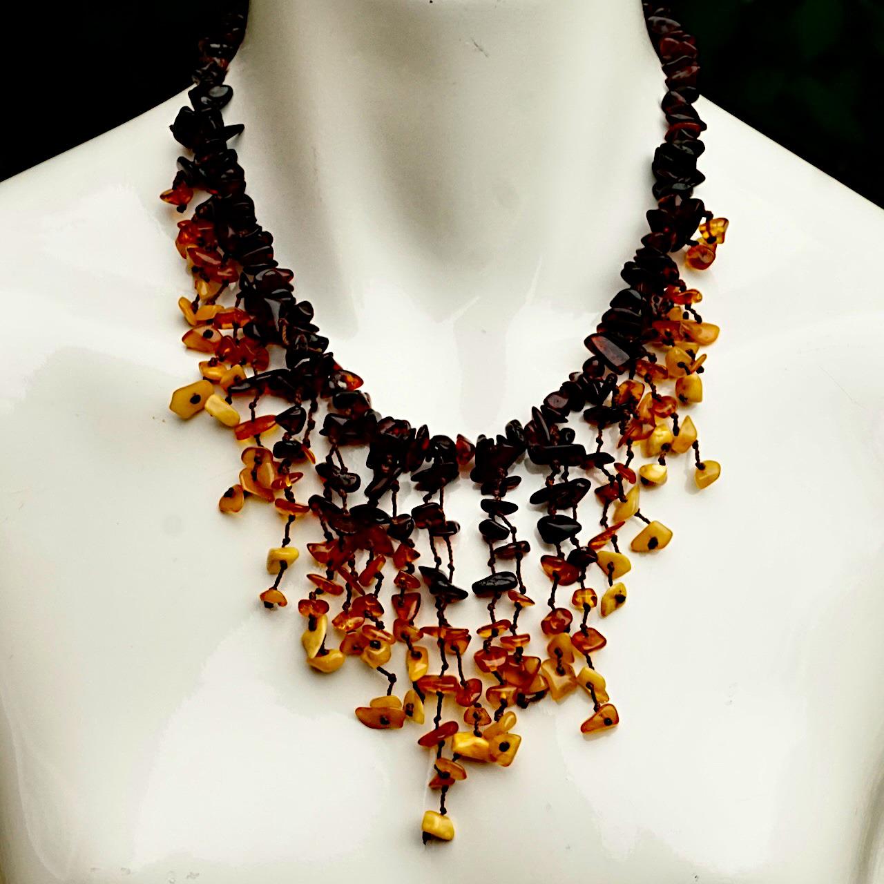 Wonderful polished amber bead necklace with beautiful amber drops in three colours. The necklace length is 44 cm / 17.3 inches, and the longest drop is 8.5 cm / 3.3 inches. The necklace is in very good condition, there is possibly one drop missing.