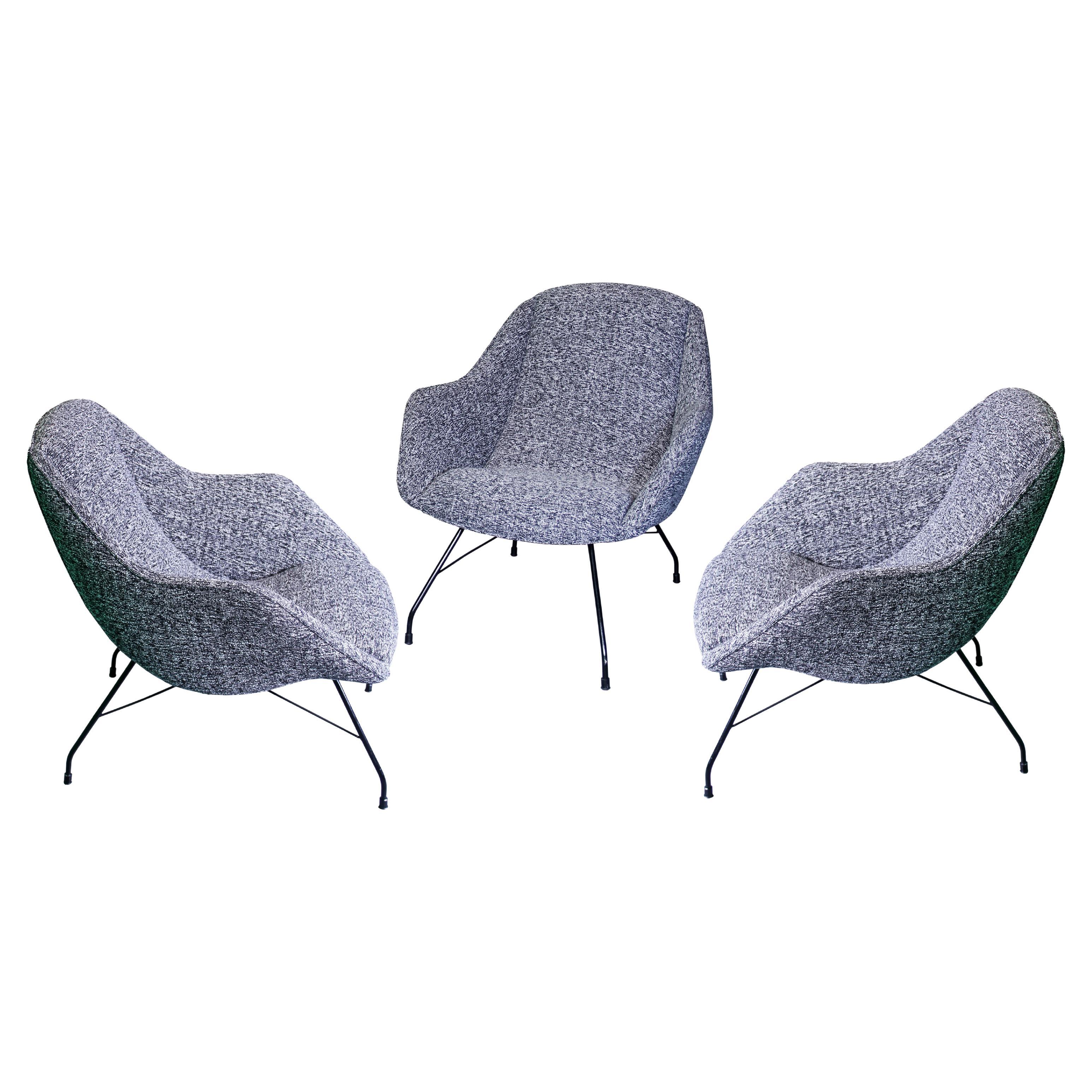 Three stunning original ‘Concha’ (shell) lounge chairs designed by Carlo Hauner and Martin Eisler, manufactured by Forma Moveis, Brazil, 1960s. 
These chairs have a solid steel structure painted black, and shell seat newly upholstered completely by