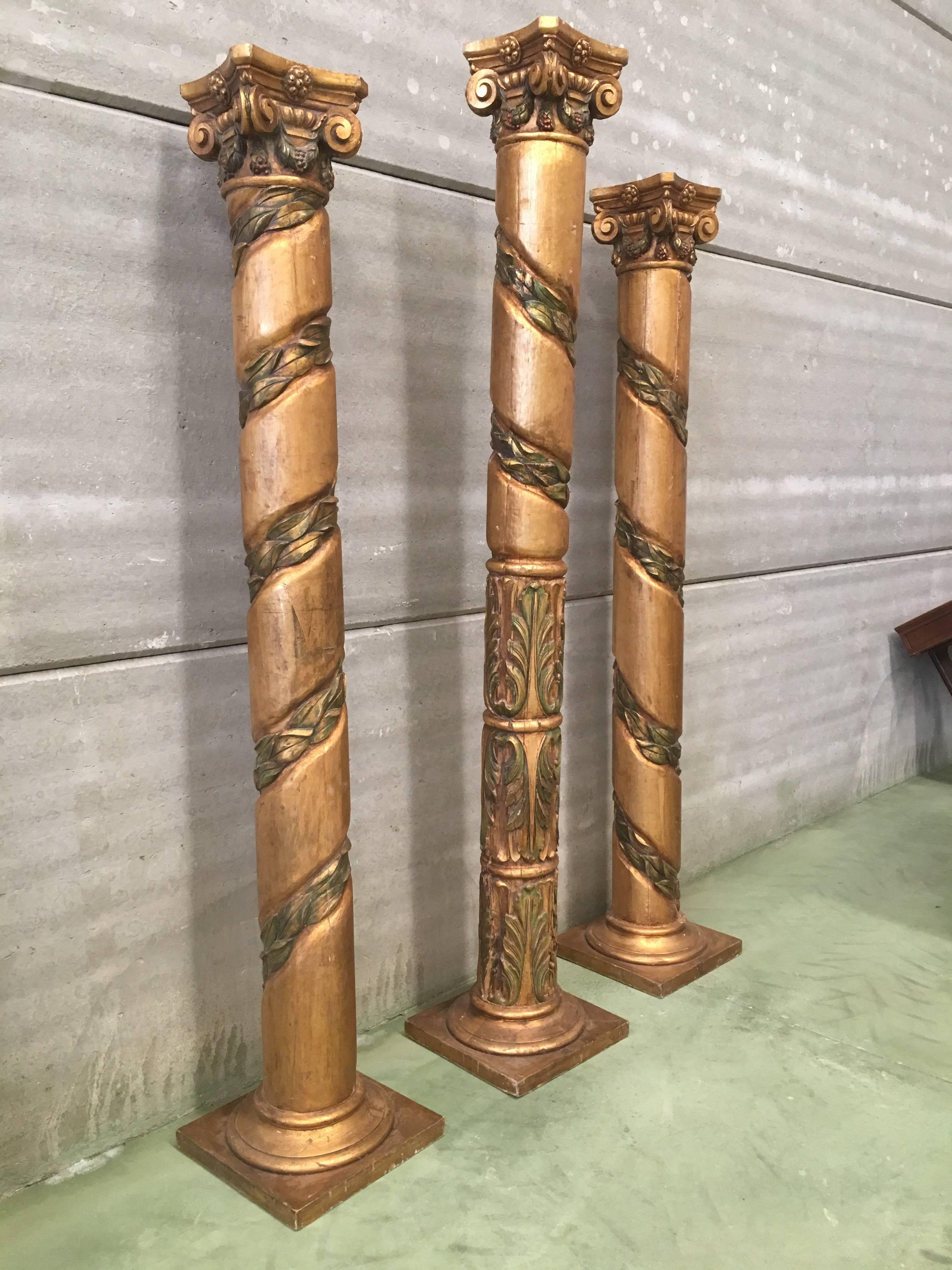 Set of three 20th century Spanish carved gilt and polychrome wood columns
A spectacular set of 20th century Spanish Mannerist (Late Renaissance) carved gilt and polychrome wood columns, with Corinthian tops and herringbone motif. The gilding and