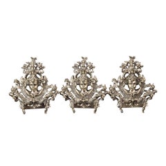 Three cross finials. Silver in its colour. 20th century, following 18th century