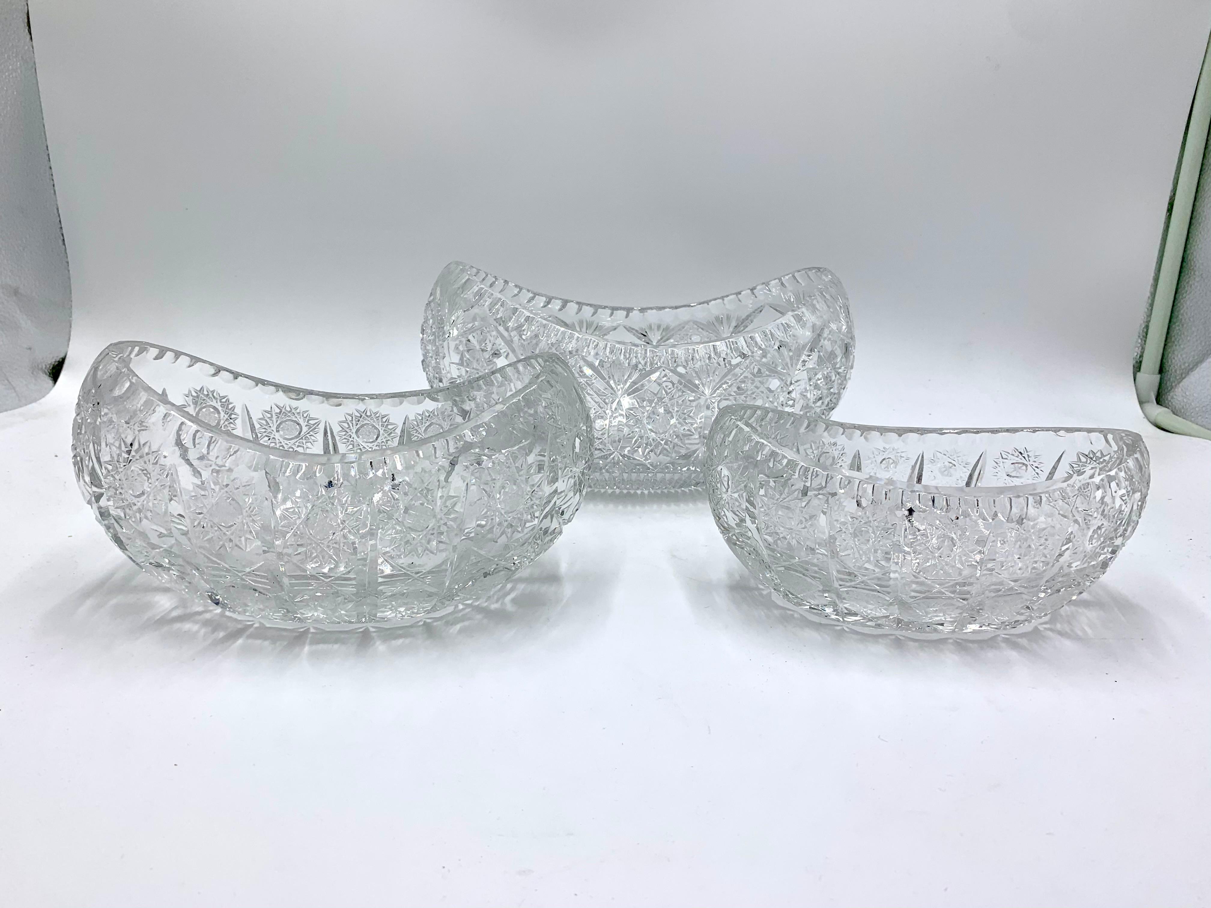 Three crystal oval boat-like decorative bowls
Produced in Poland in 1950s. 
Very good condition 
Measures: The biggest : Height : 14cm width 24cm depth 14cm
Medium : Height 11cm width 21cm depth 11cm 
Small : Height 8cm width 18cm depth 10cm.