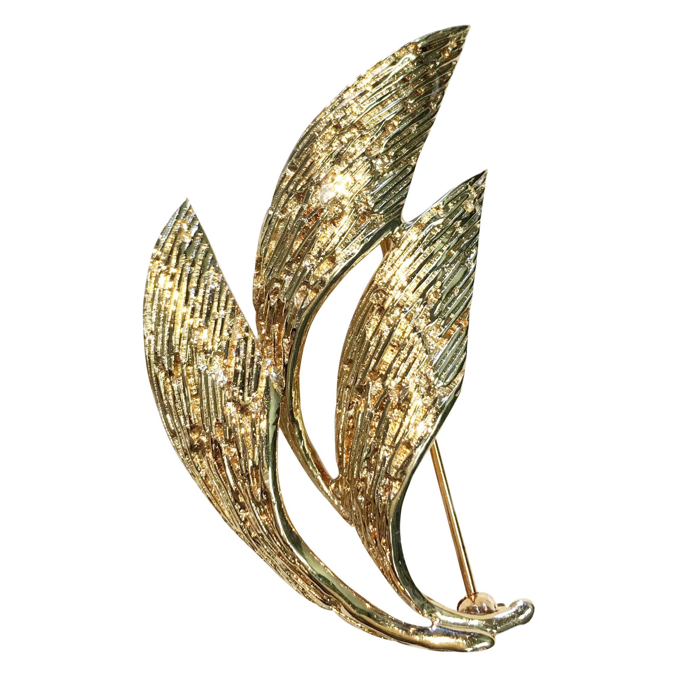 Drei geschwungene blattähnliche Brosche / Anstecknadel aus 14 Karat Gelbgold