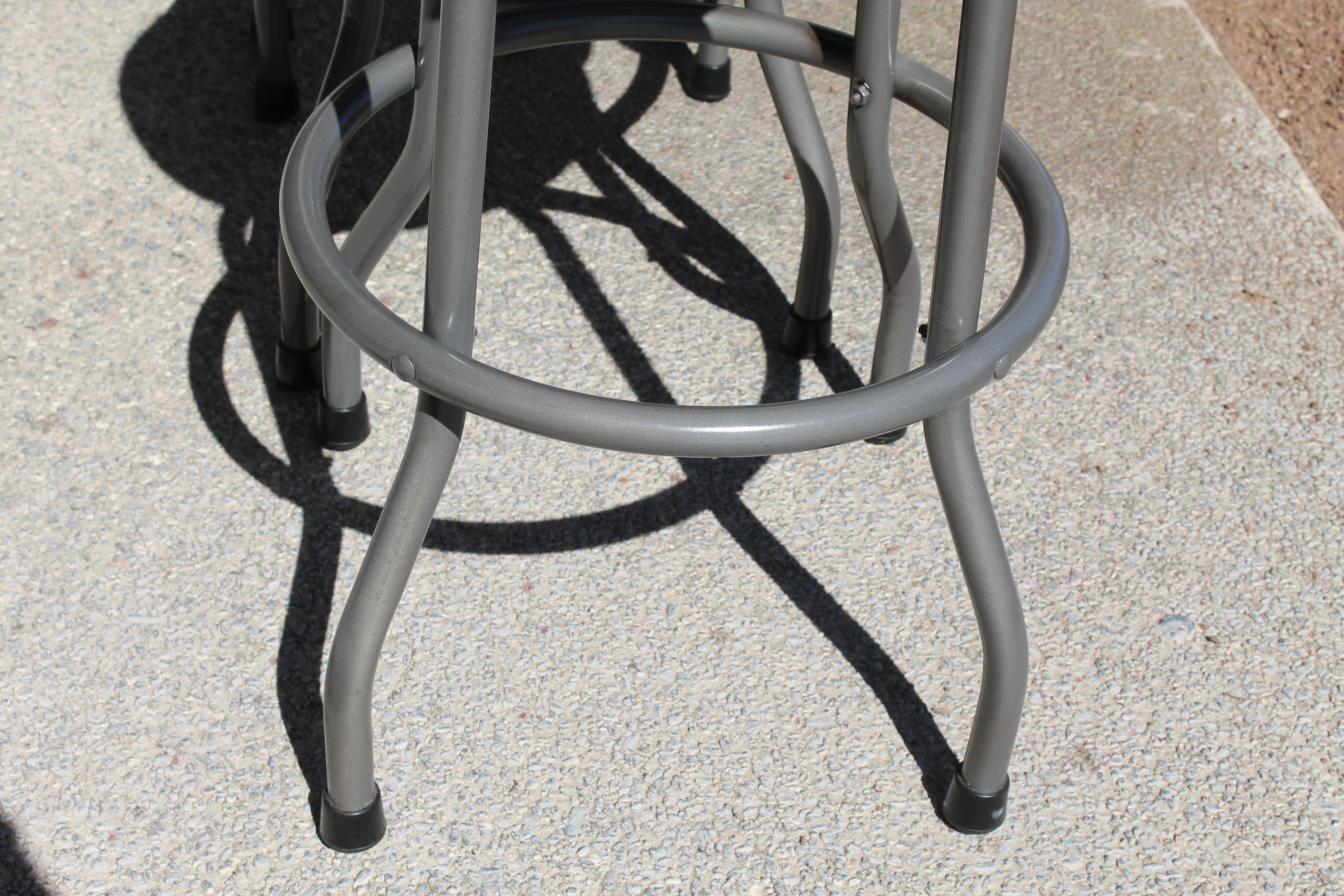 Cut Steel Three Modernist Futuristic Swivel Barstools For Sale