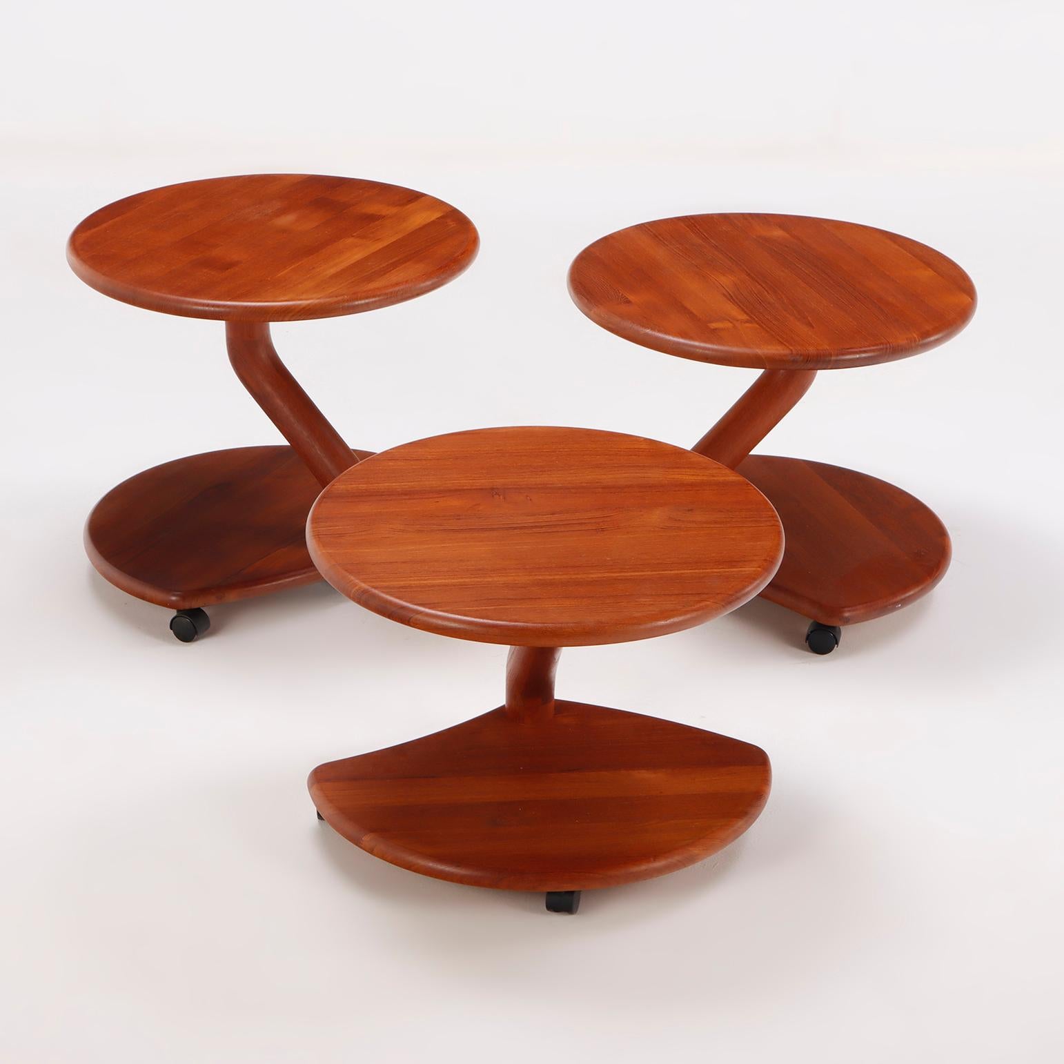 A set of three Danish mid century modern Niels Bach teak Model 53 mushroom nesting tables.