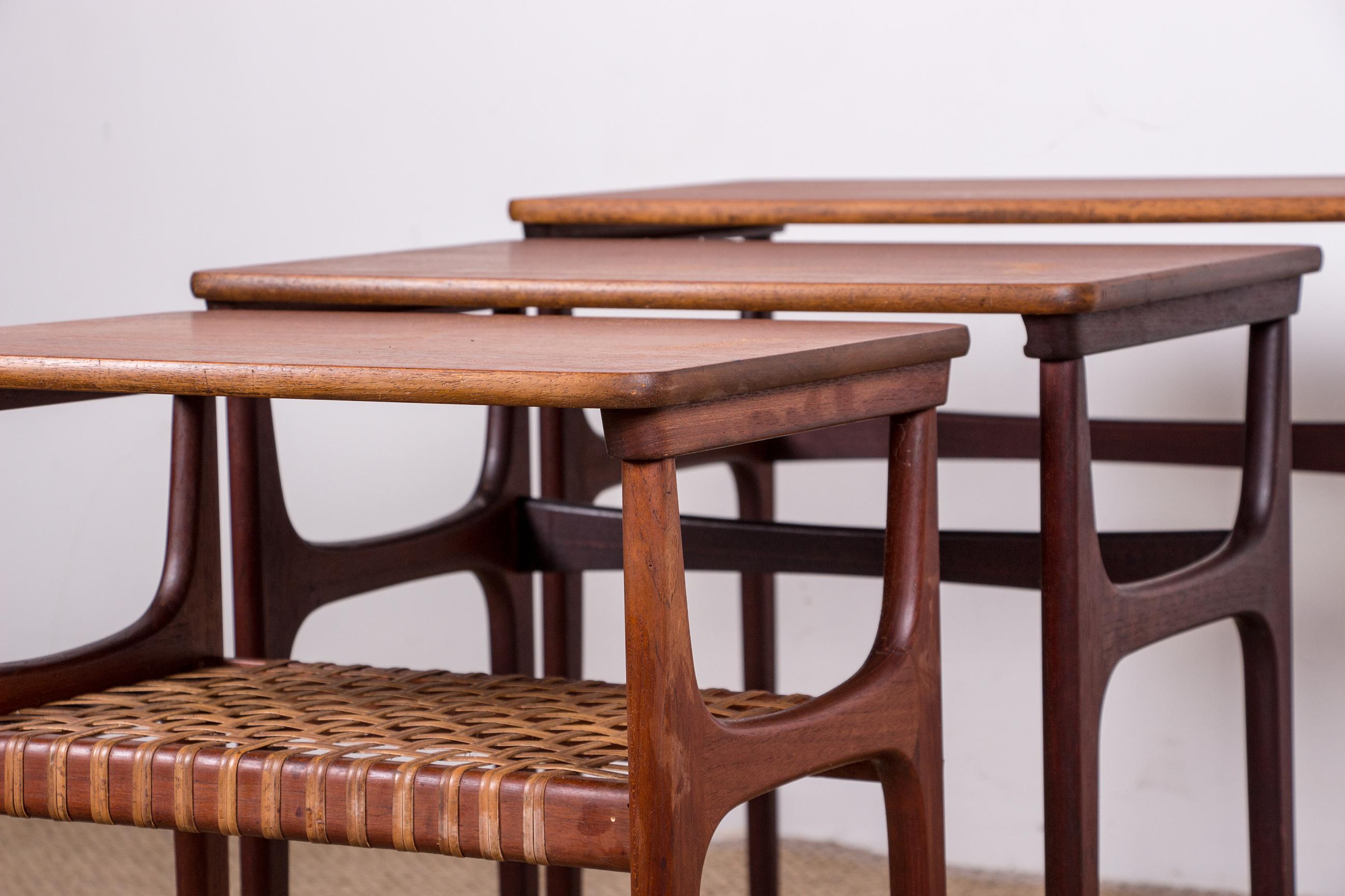 Scandinavian Modern Three Danish Teak and Caning Nesting Tables by Erling Torvits for Heltborg For Sale