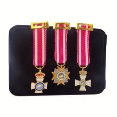 Three decorations of the Order of Saint Hermenegild, brass and Ottoman ribbon