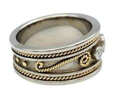 Three Diamond Band Ring with Twisted Scroll Motif in Two-Toned 18 Karat Gold