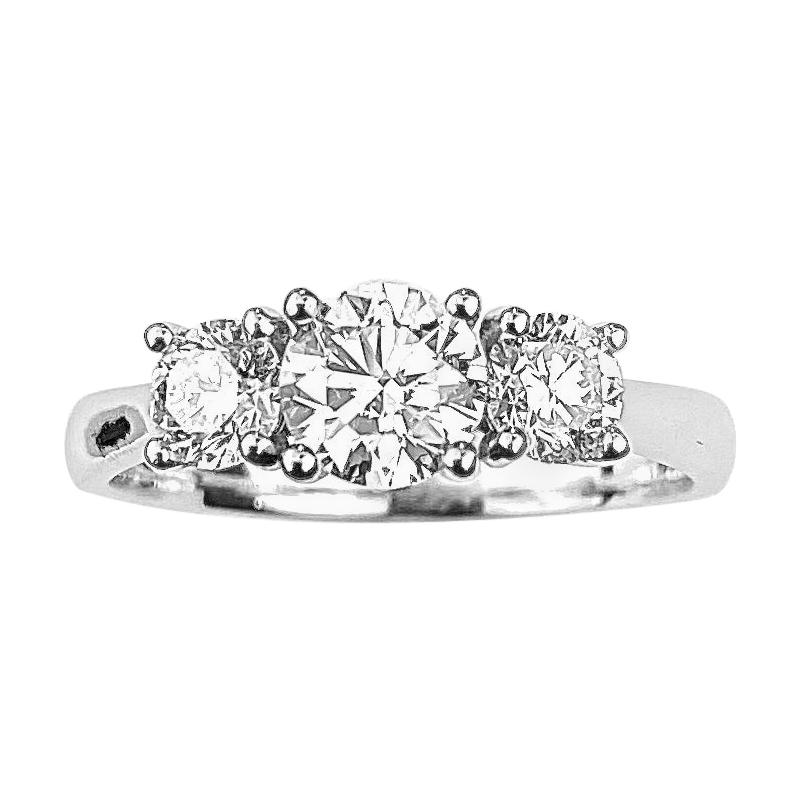 Three-Diamond Ring with 0.60 Carat Center Diamond in White Gold For Sale