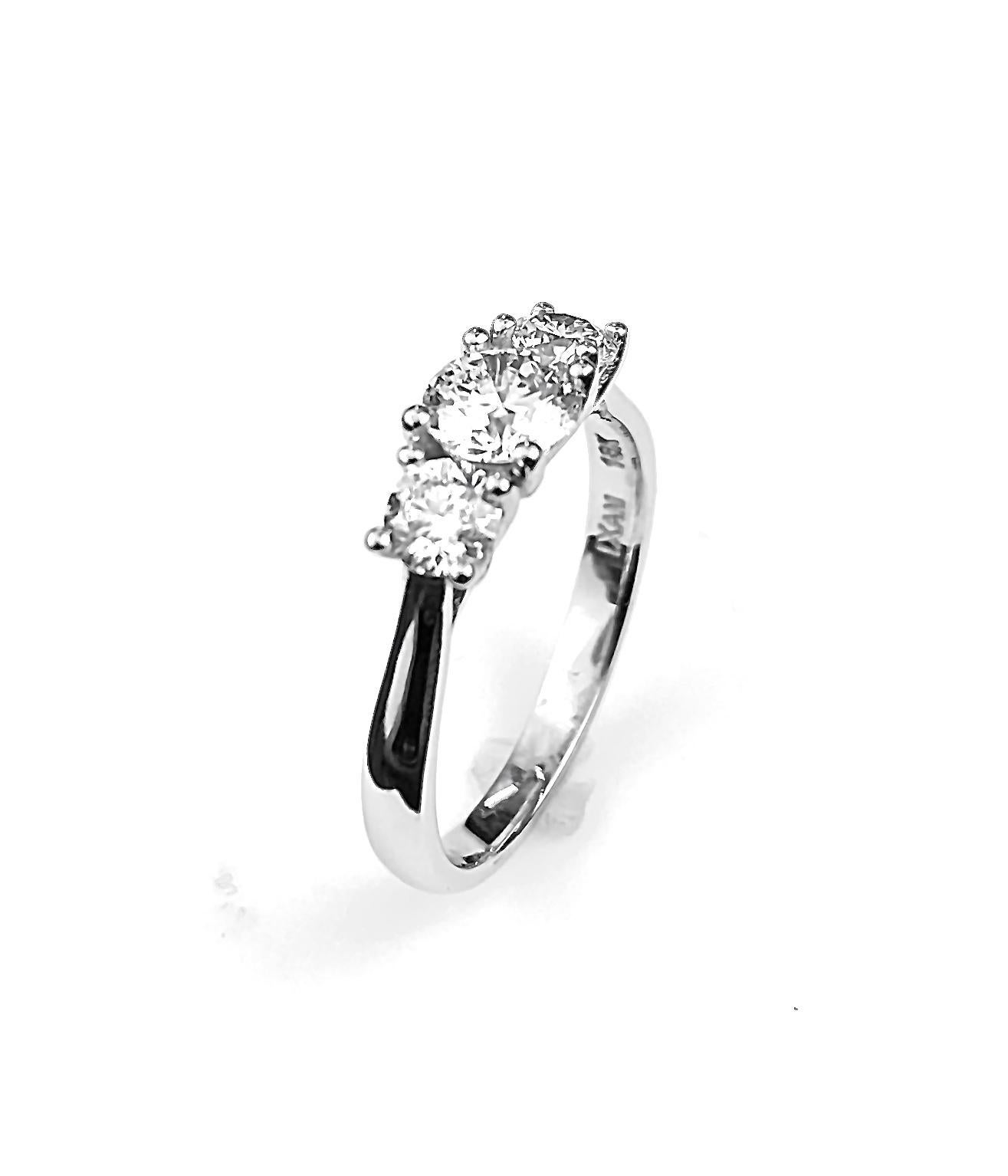 Women's Three-Diamond Ring with 0.60 Carat Center Diamond in White Gold For Sale