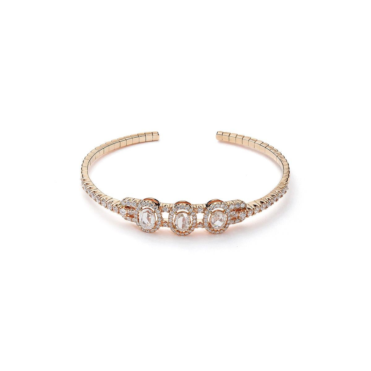 Bangle in 18kt pink gold set with 3 oval rose cut diamond 1.20 cts and 96 diamonds 1.49 cts     