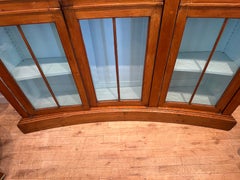 Three Door Bowed Antique Cabinet