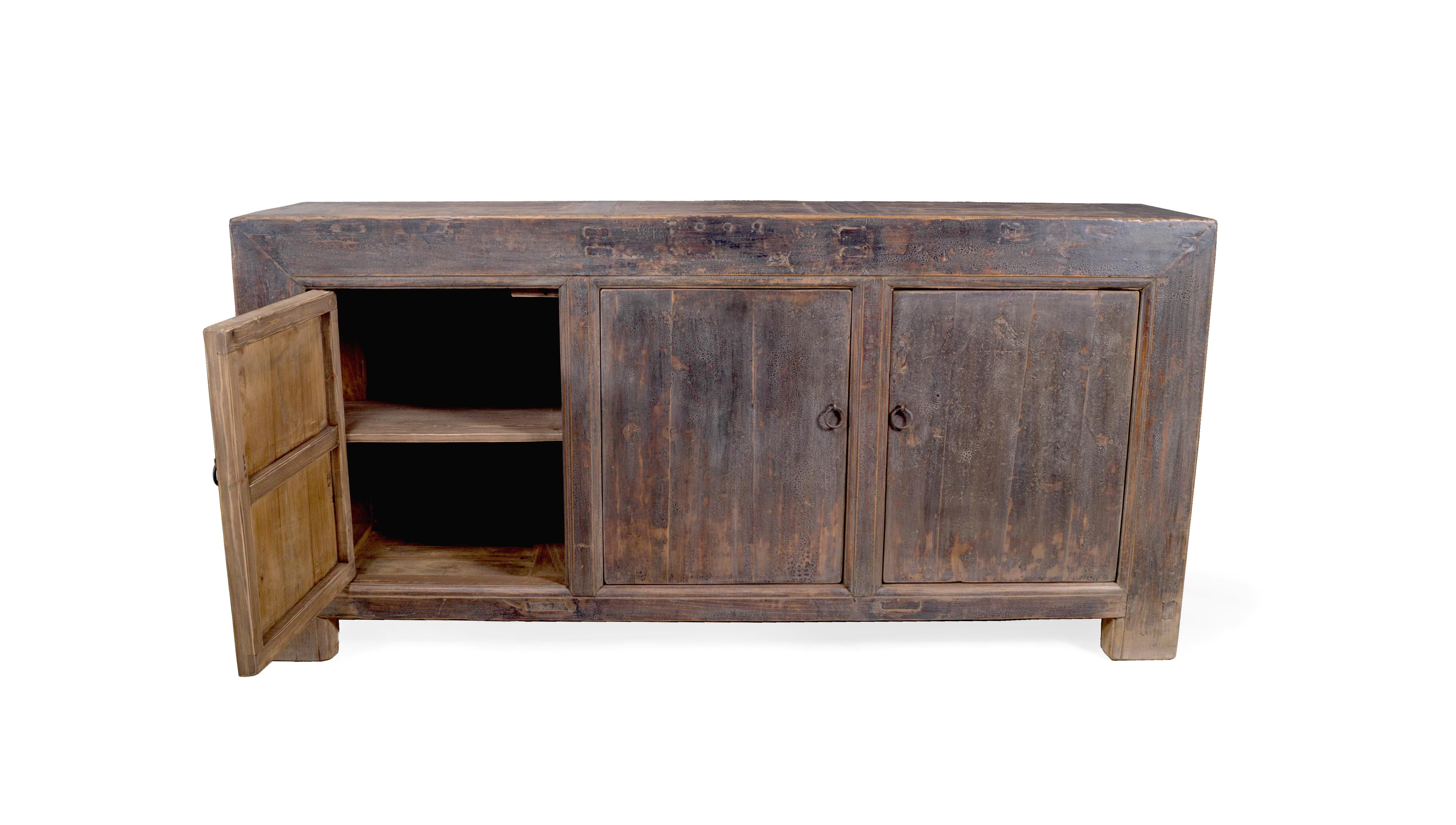 This three door server features a one of a kind warm gray tones paint patina. This piece can truly fit any interior design style from transitional to modern organic, industrial, or traditional. 

This piece is a part of Brendan Bass’s