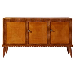 Three-door sideboard in oak wood with carved chestnut inserts, Italy, 1940s