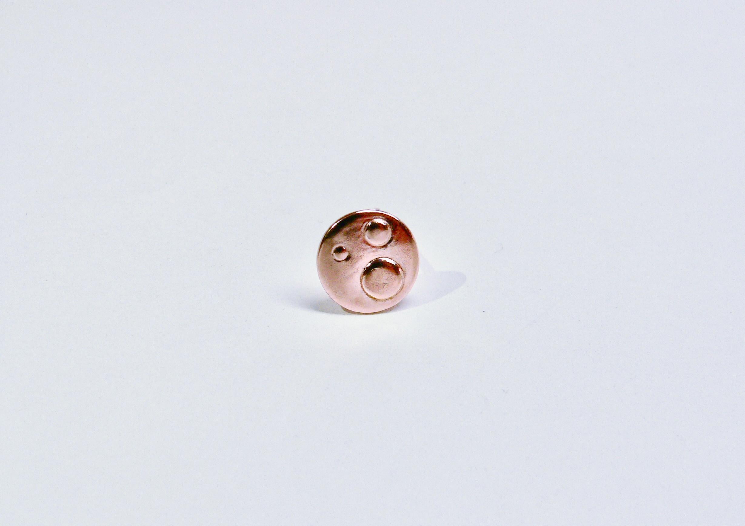 Three dots on the round field is dancing on your ear.

There are three colors of this item, Pink gold, Yellow gold and Black rhodium color. 

This single earring is made of Sterling Silver with 18 Karat pink gold plated as one of the Geometry
