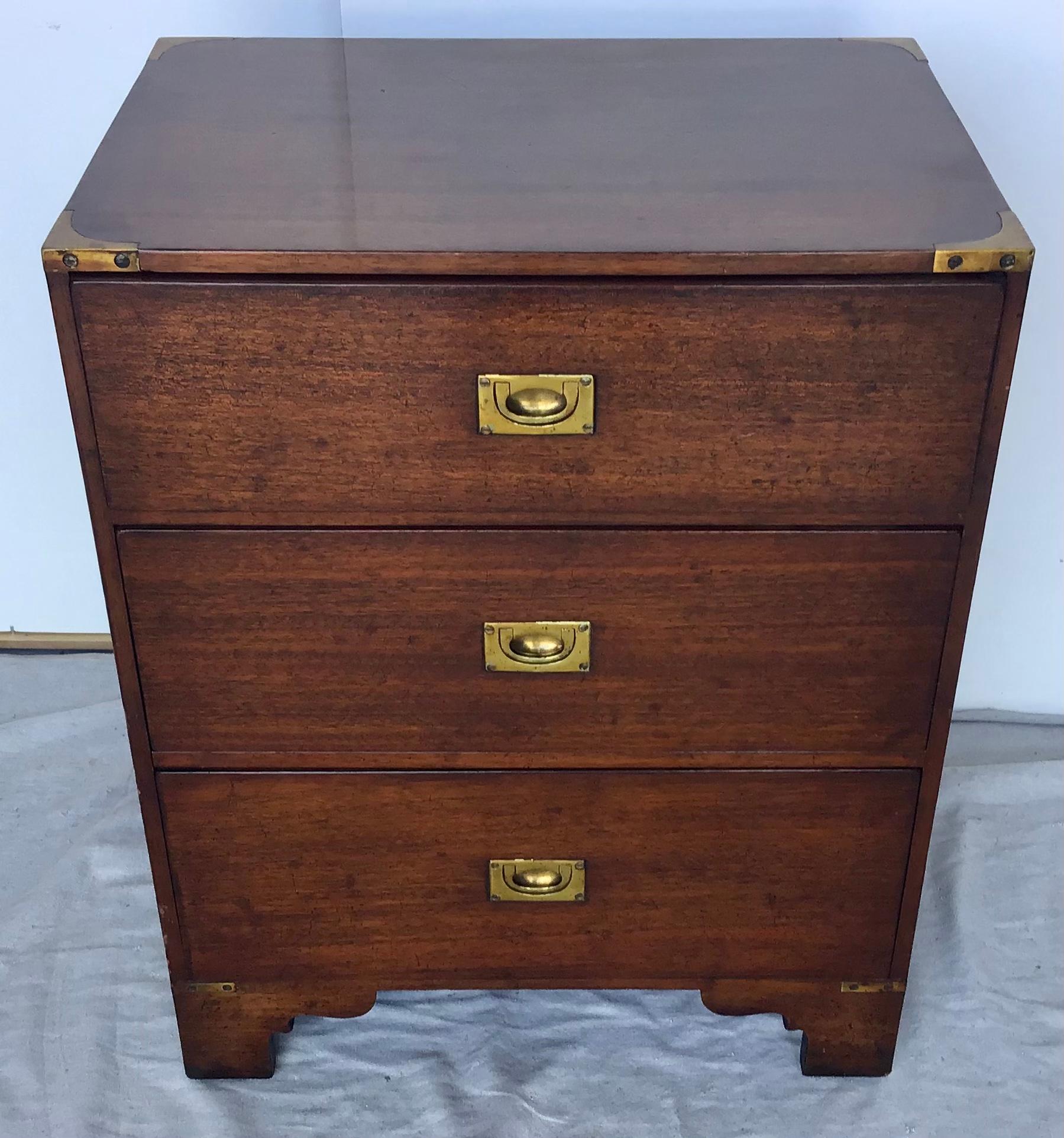 Early 20th century bench made Campaign Side Cabinet, nightstand or side table. Mahogany with brass campaign style hardware on the sides and drawer fronts. Can be used as a side table or next to the bed. 