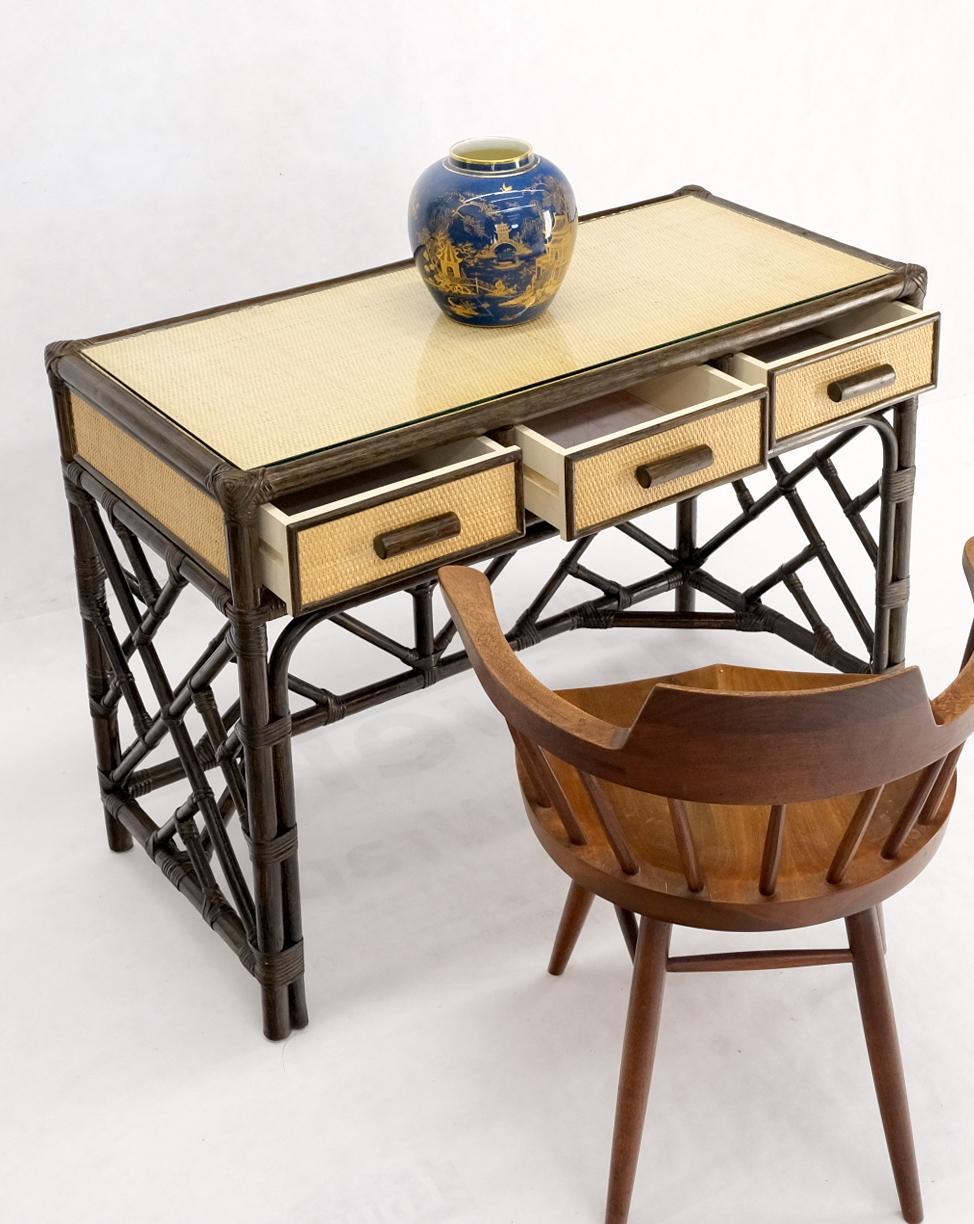 Decorative cane & reed three drawer compact entry hall desk writing table or console with glass top.