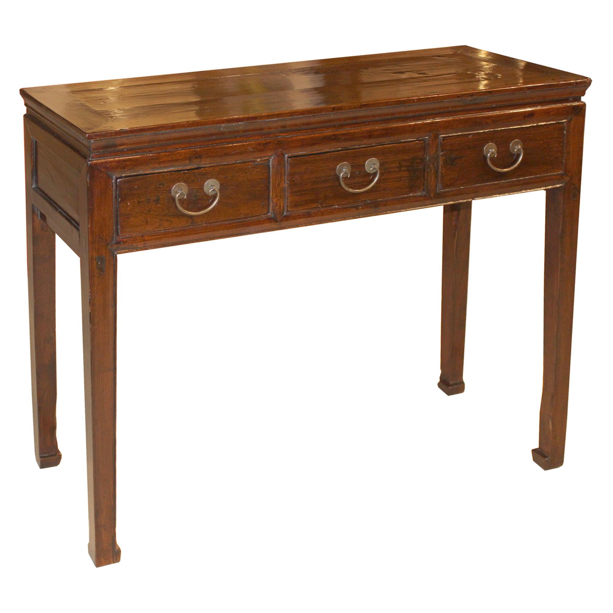 Three-drawer elm console table with horse hoof style feet. New hardware.