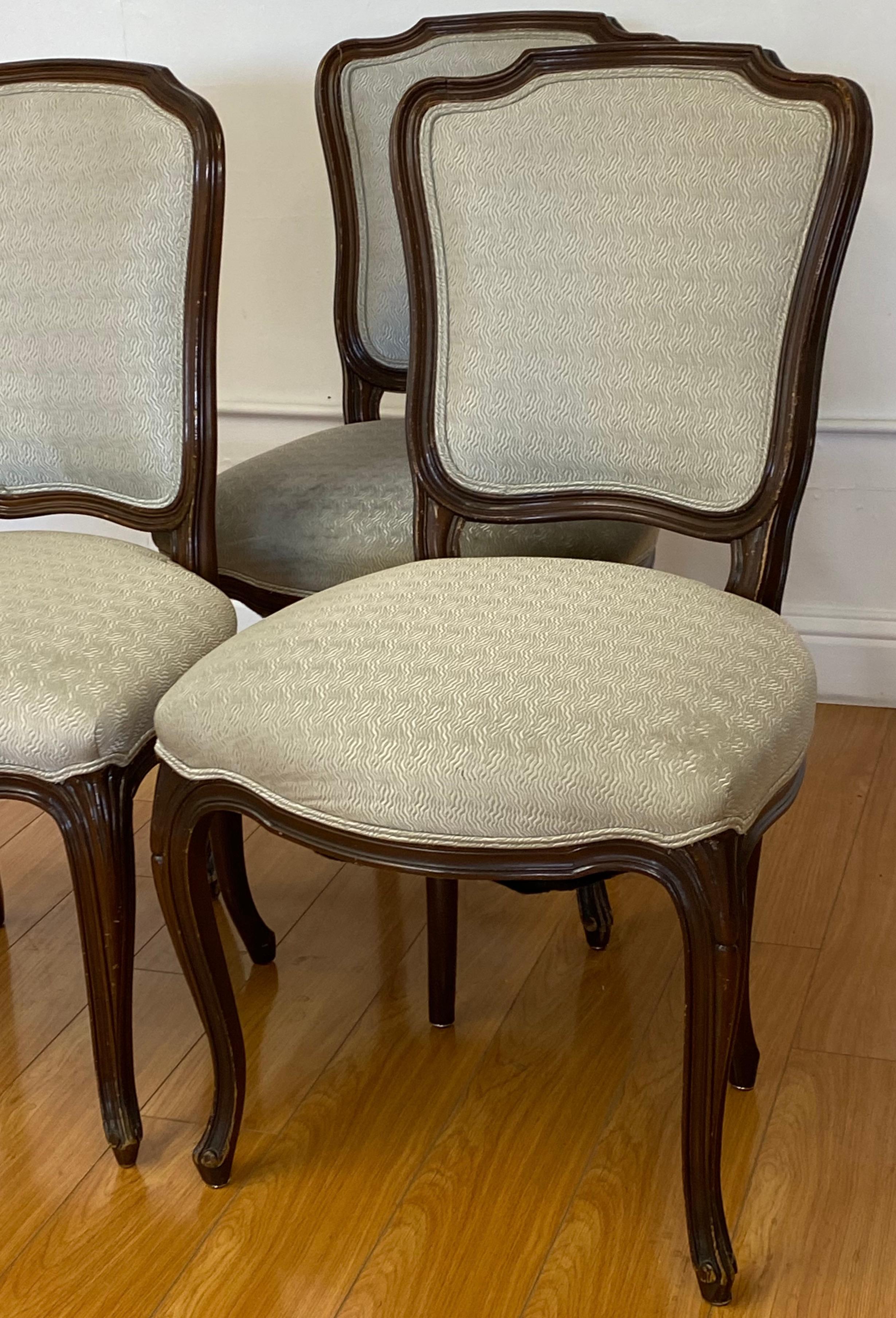 Three early 20th century French walnut carved side chairs, circa 1900

Classic French walnut side chairs. Each chair is carved from solid walnut. The chair are currently sporting a neutral fabric with piping

These chairs can be used 